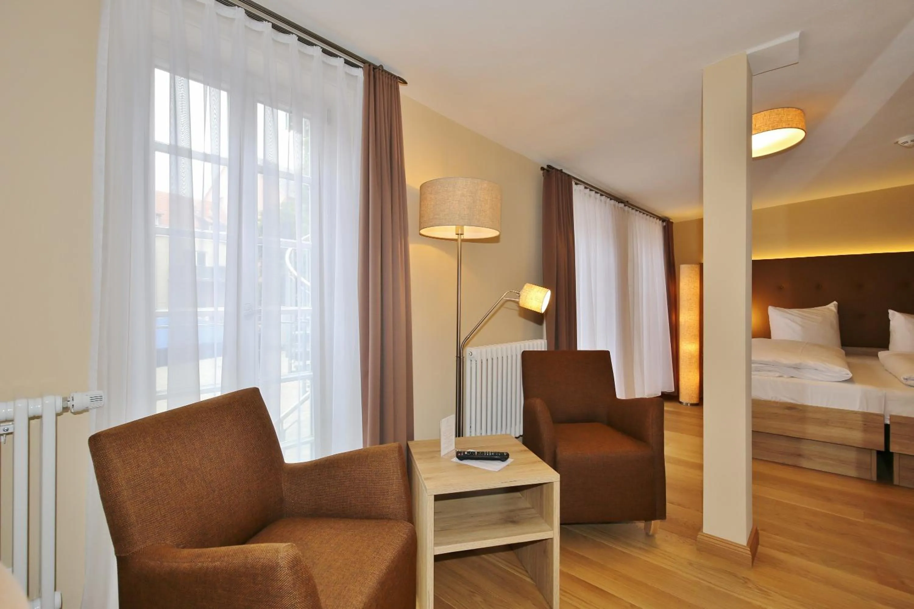 Seating area, Bed in Hotel Theophano