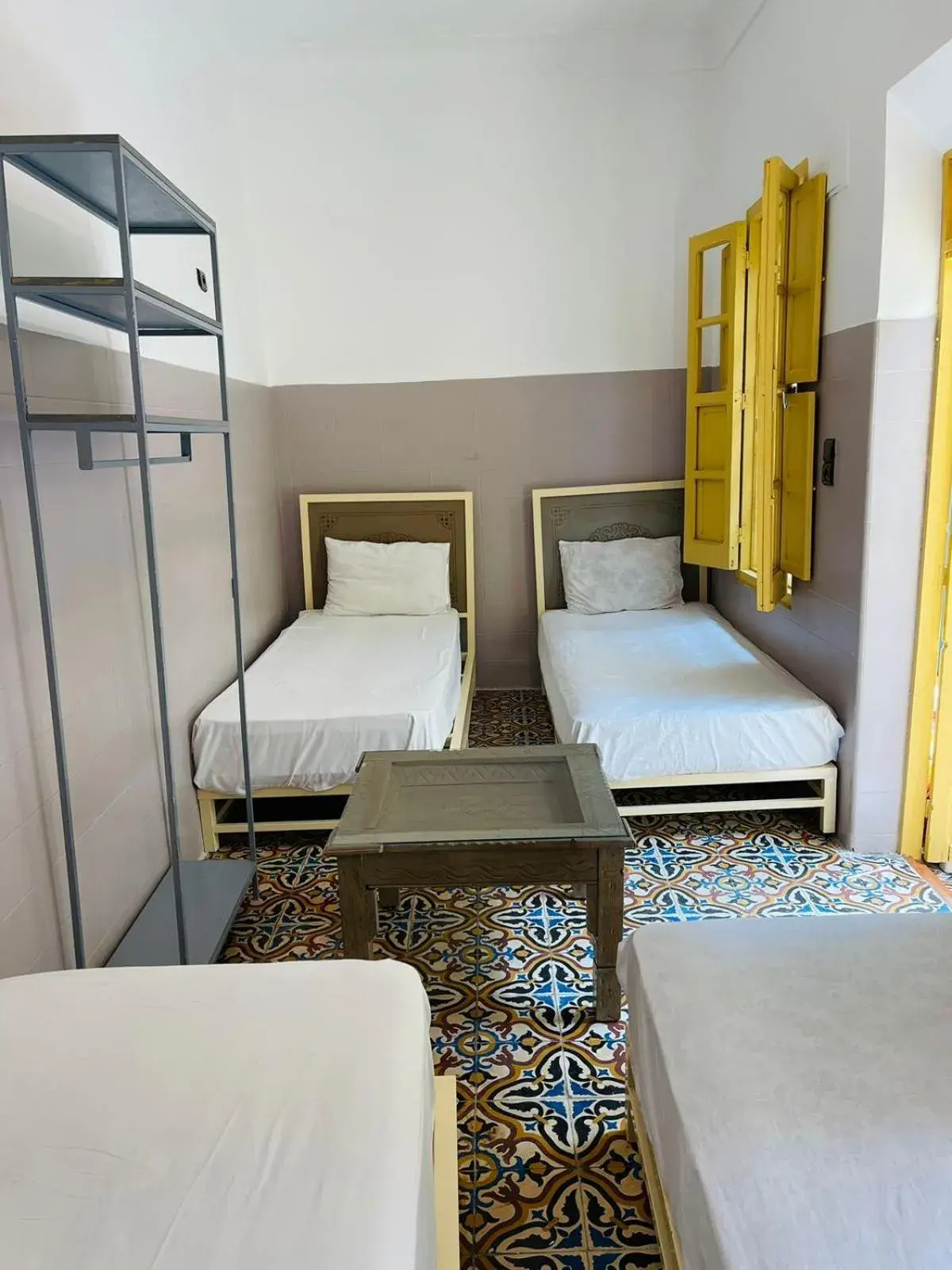 Economy Quadruple Room with Shared Bathroom in The Madrassa Hostel Economy Quadruple Room with Shared Bathroom in The Madrassa Hostel