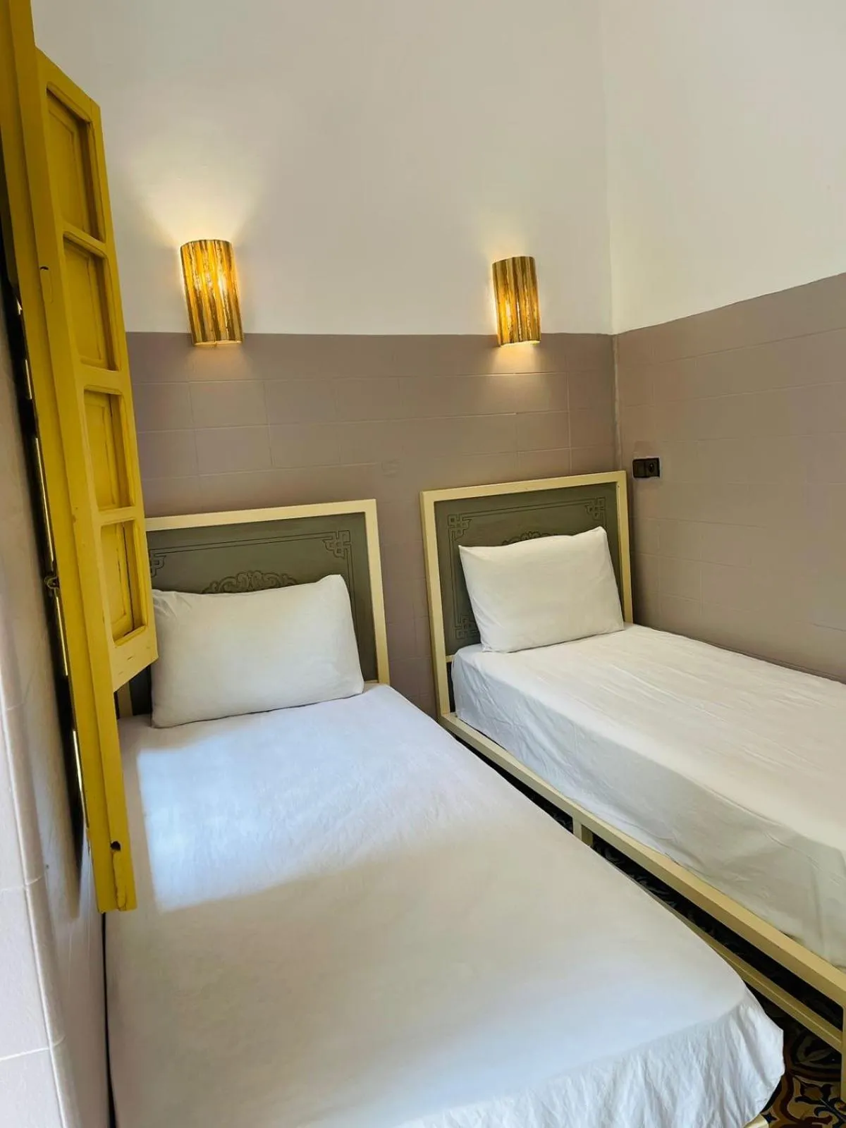 Photo of the whole room, Bed in The Madrassa Hostel