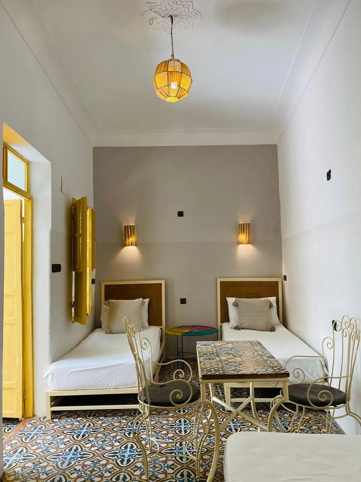 Living room, Bed in The Madrassa Hostel
