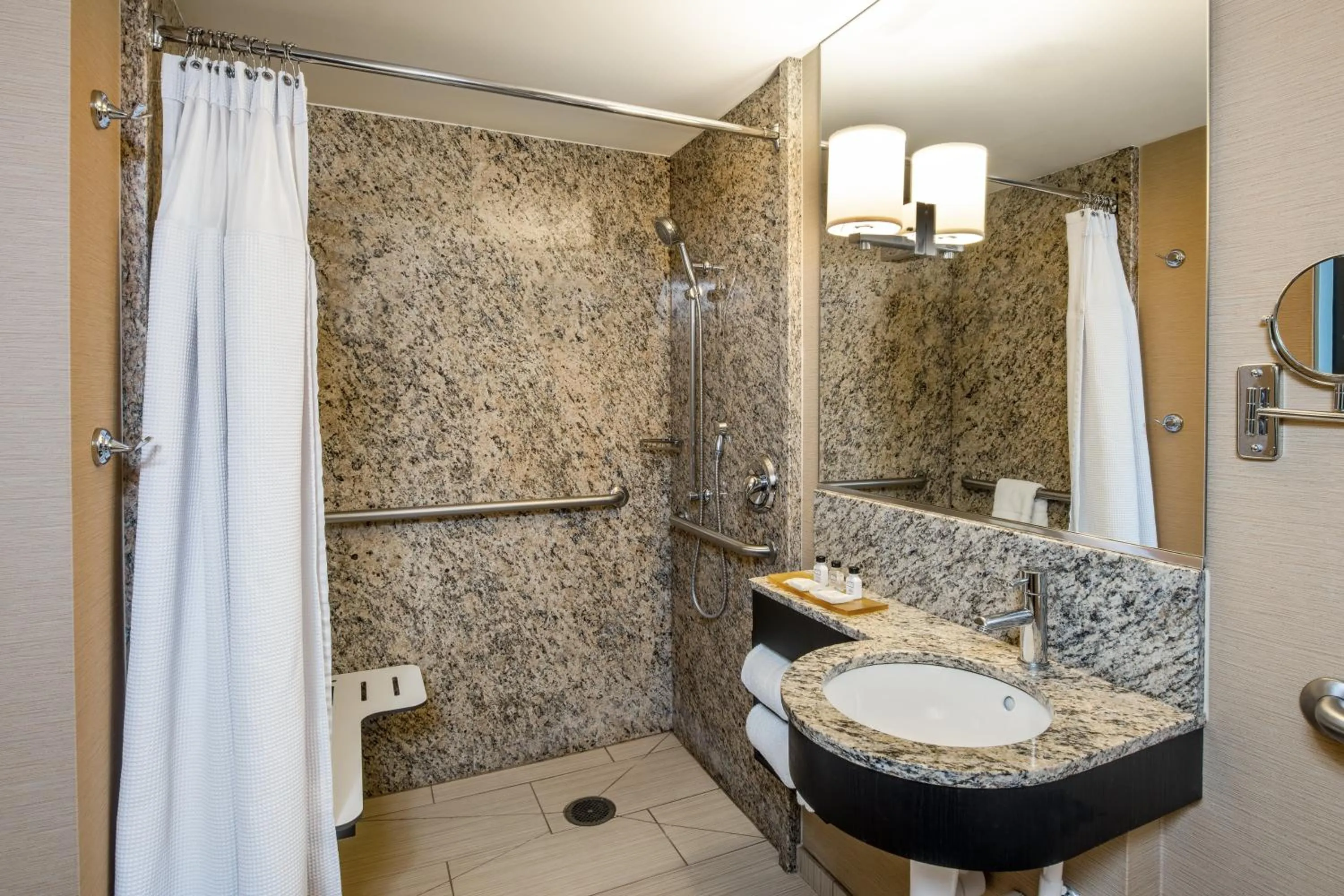 Bathroom in Crowne Plaza Chicago O'Hare Hotel & Conference Center by IHG