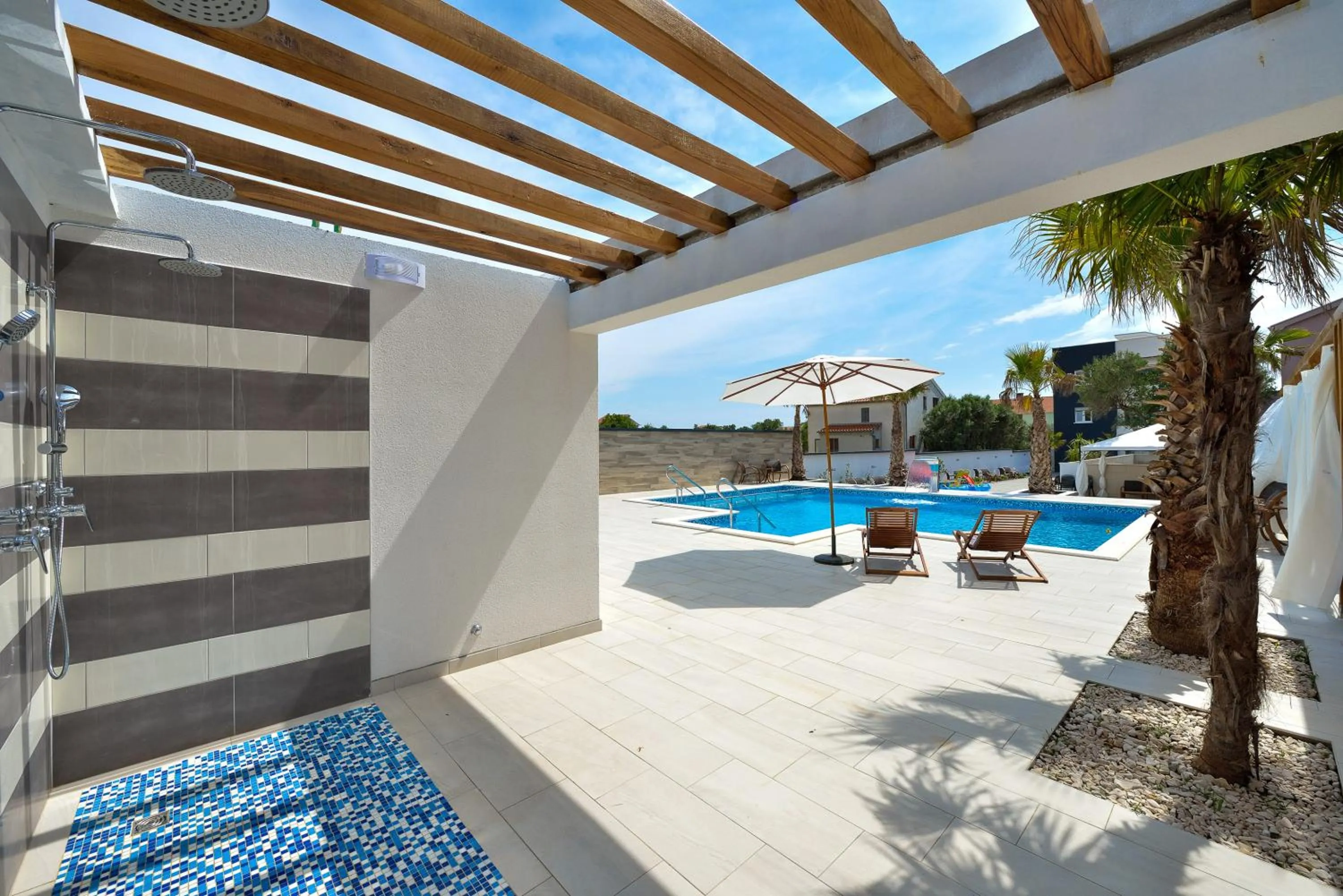 Swimming pool in Boutique Apartments Ad Astra