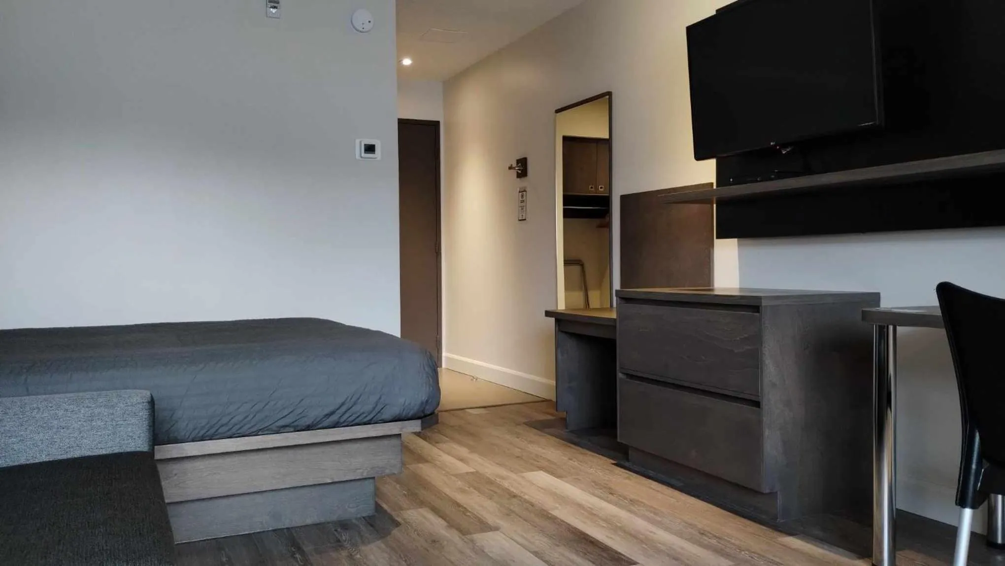 Bed in Hôtel-Motel Normandin Alma