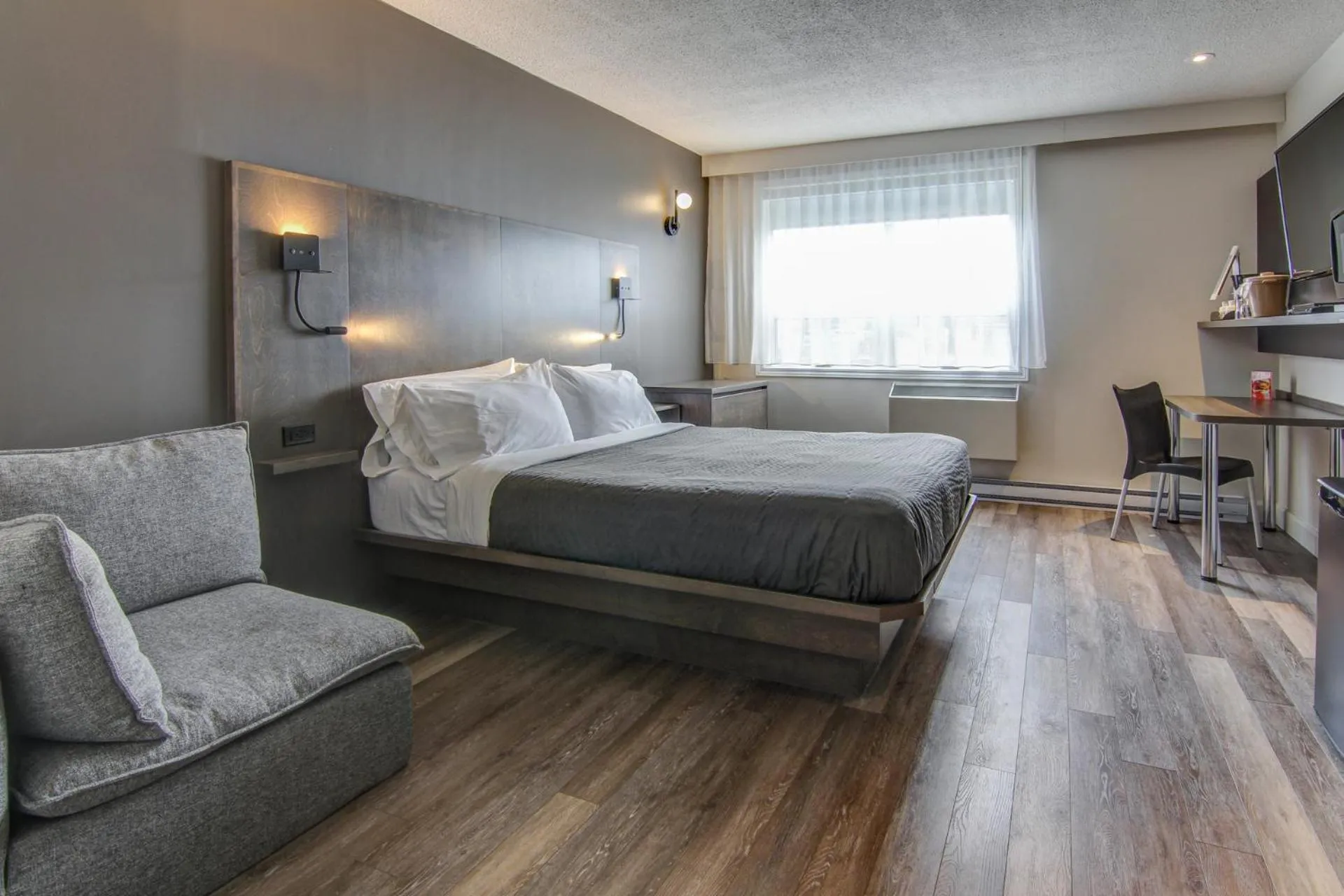 Bed in Hôtel-Motel Normandin Alma