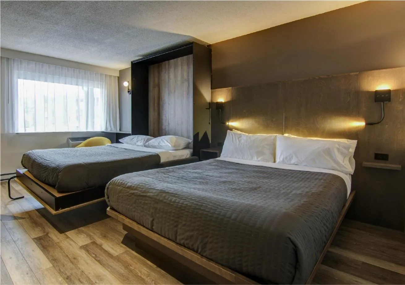 Bed in Hôtel-Motel Normandin Alma