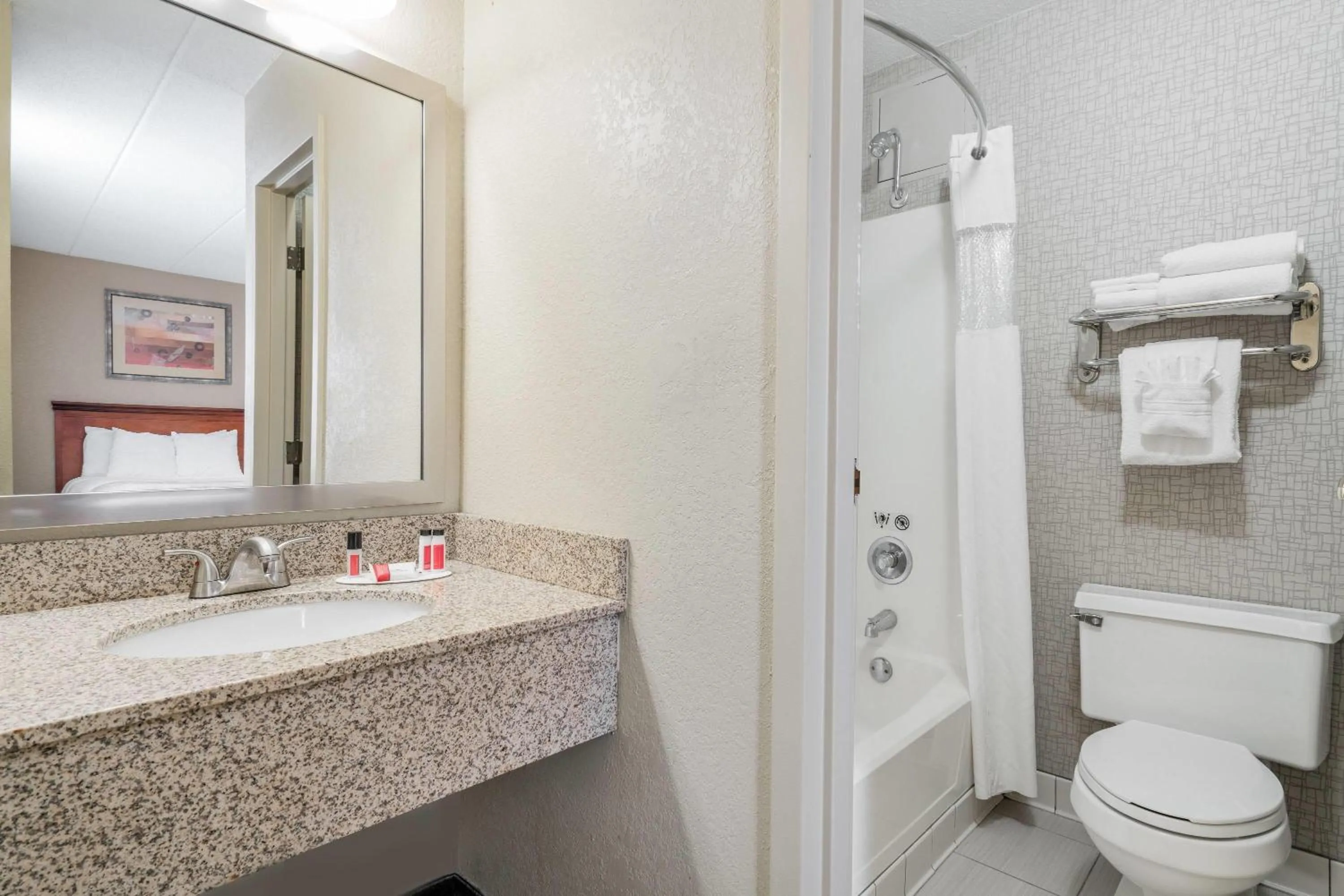 Bathroom in Days Hotel by Wyndham University Ave SE