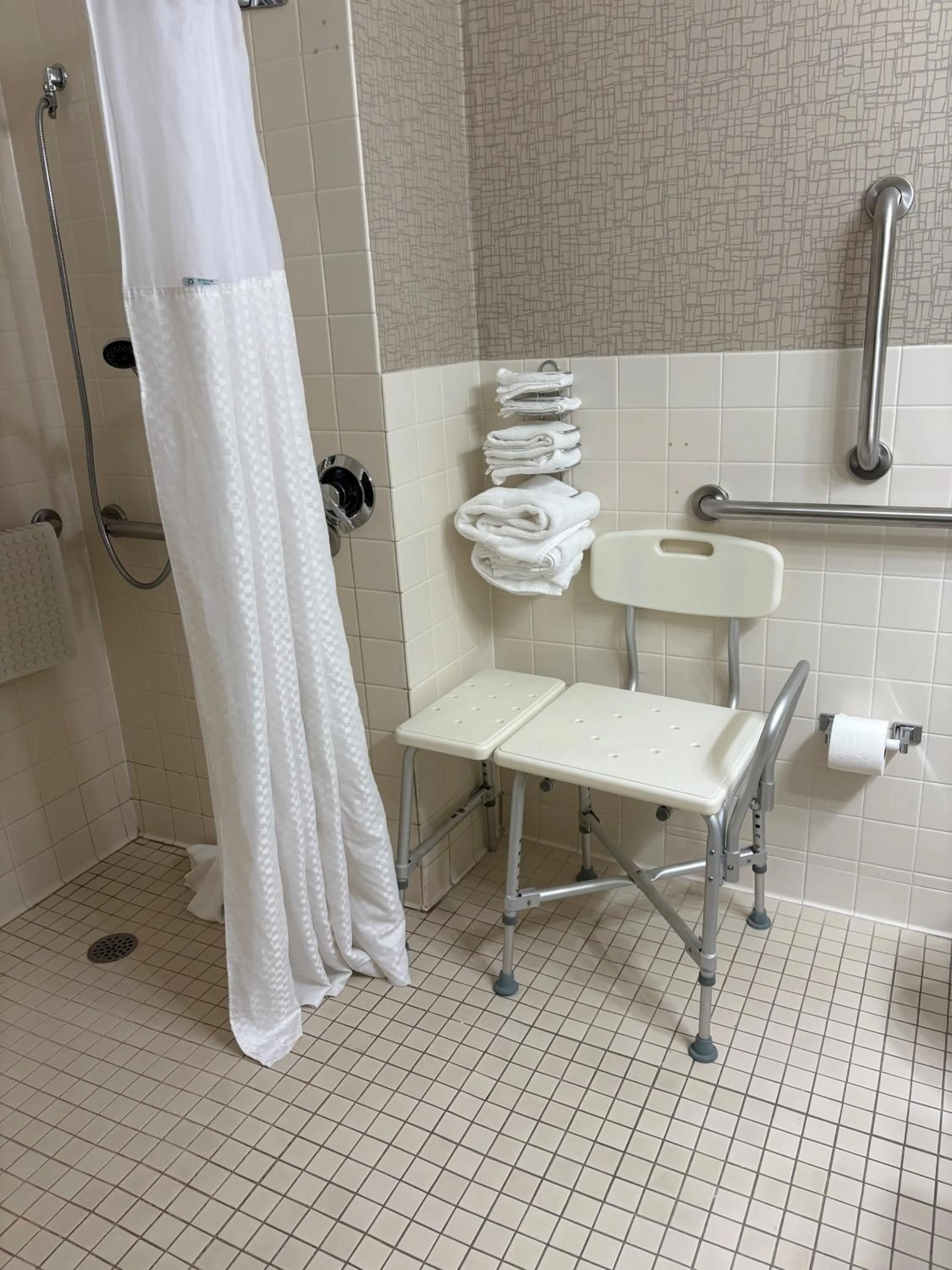 Bathroom in Days Hotel by Wyndham University Ave SE