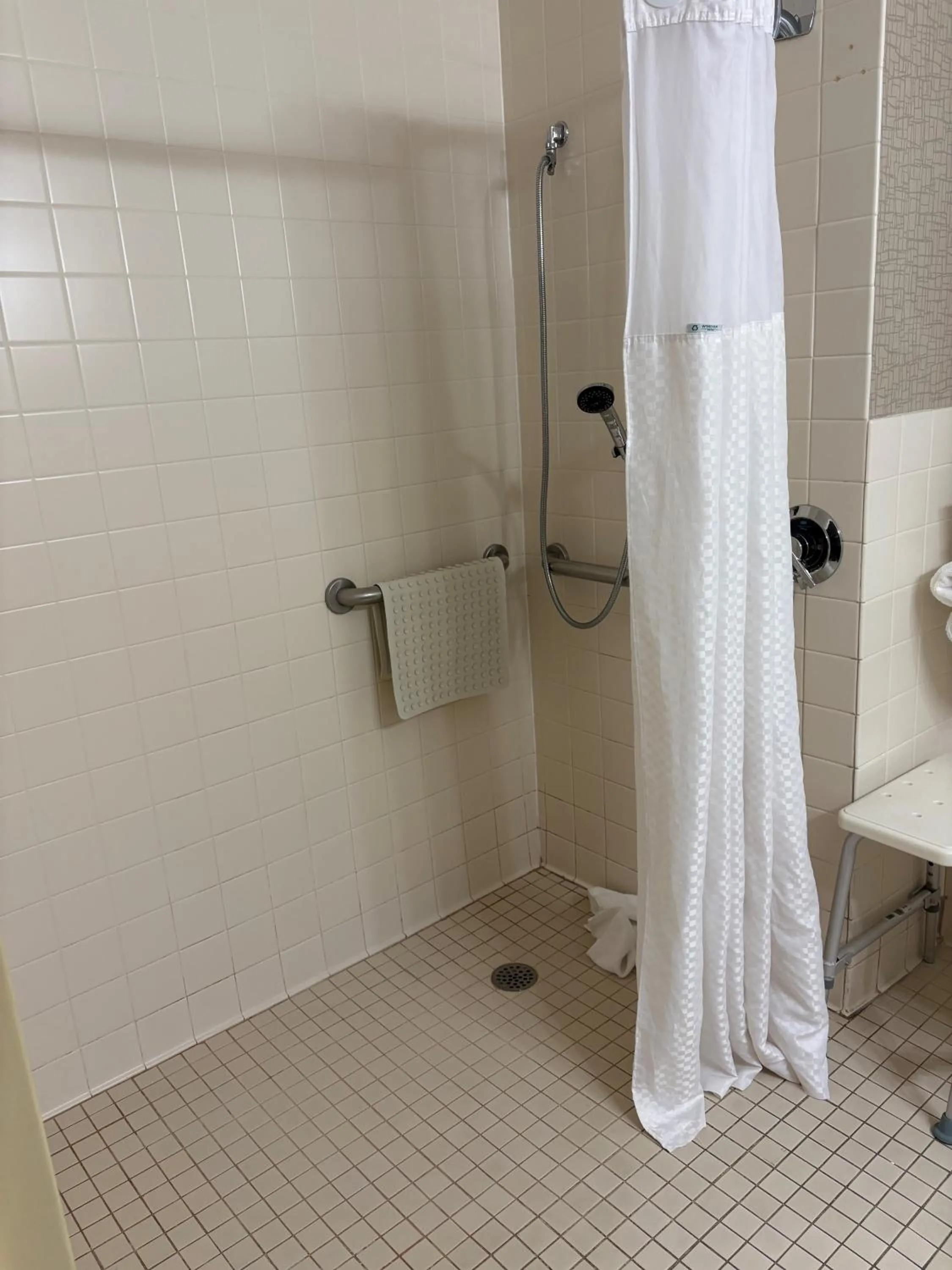 Bathroom in Days Hotel by Wyndham University Ave SE