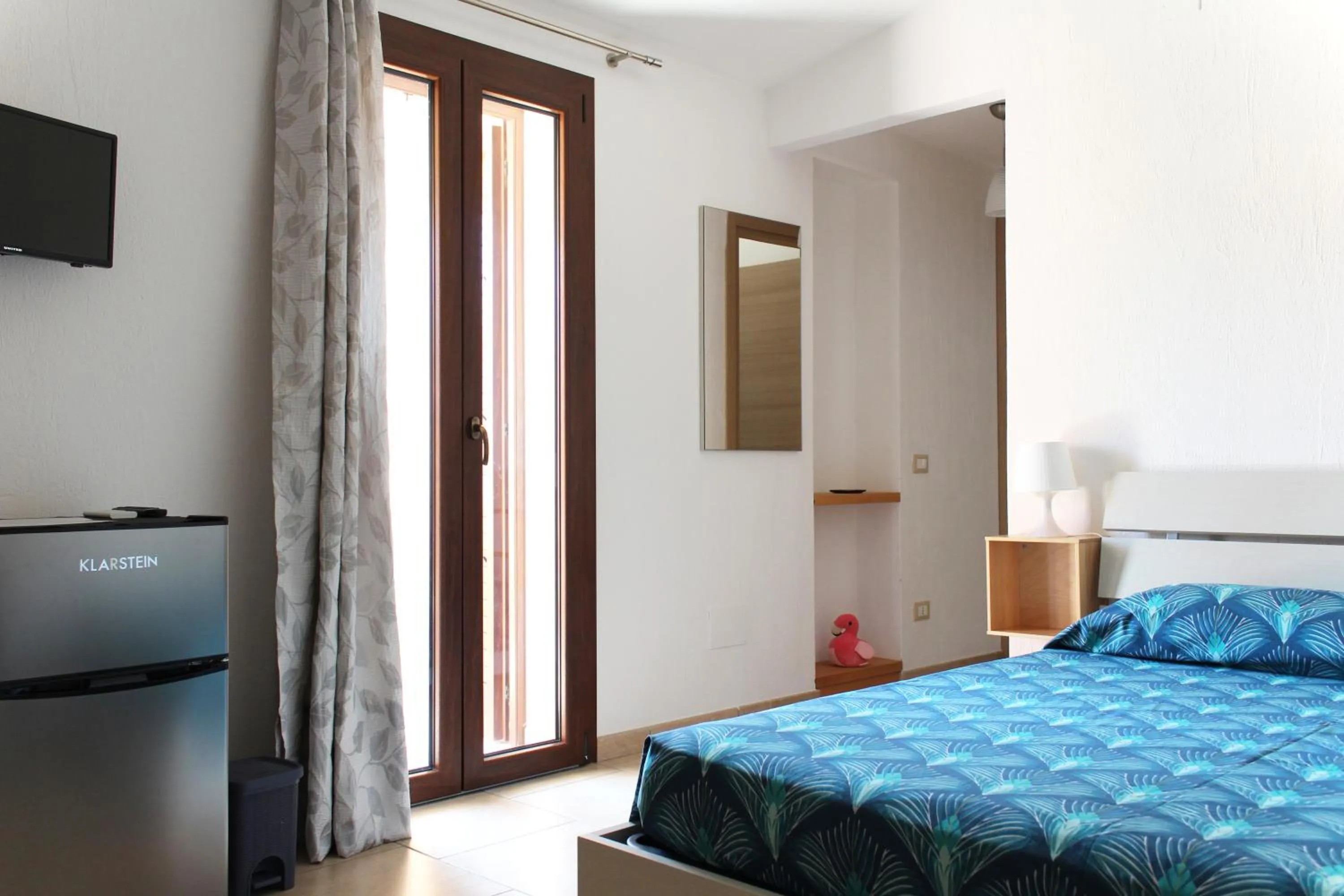 Bed in Acquachiara Rooms