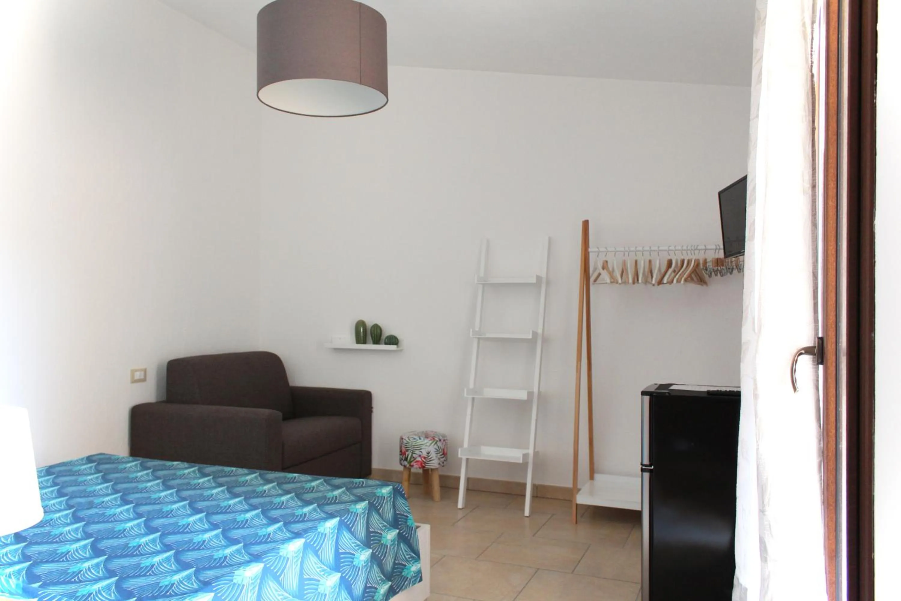 Bed in Acquachiara Rooms