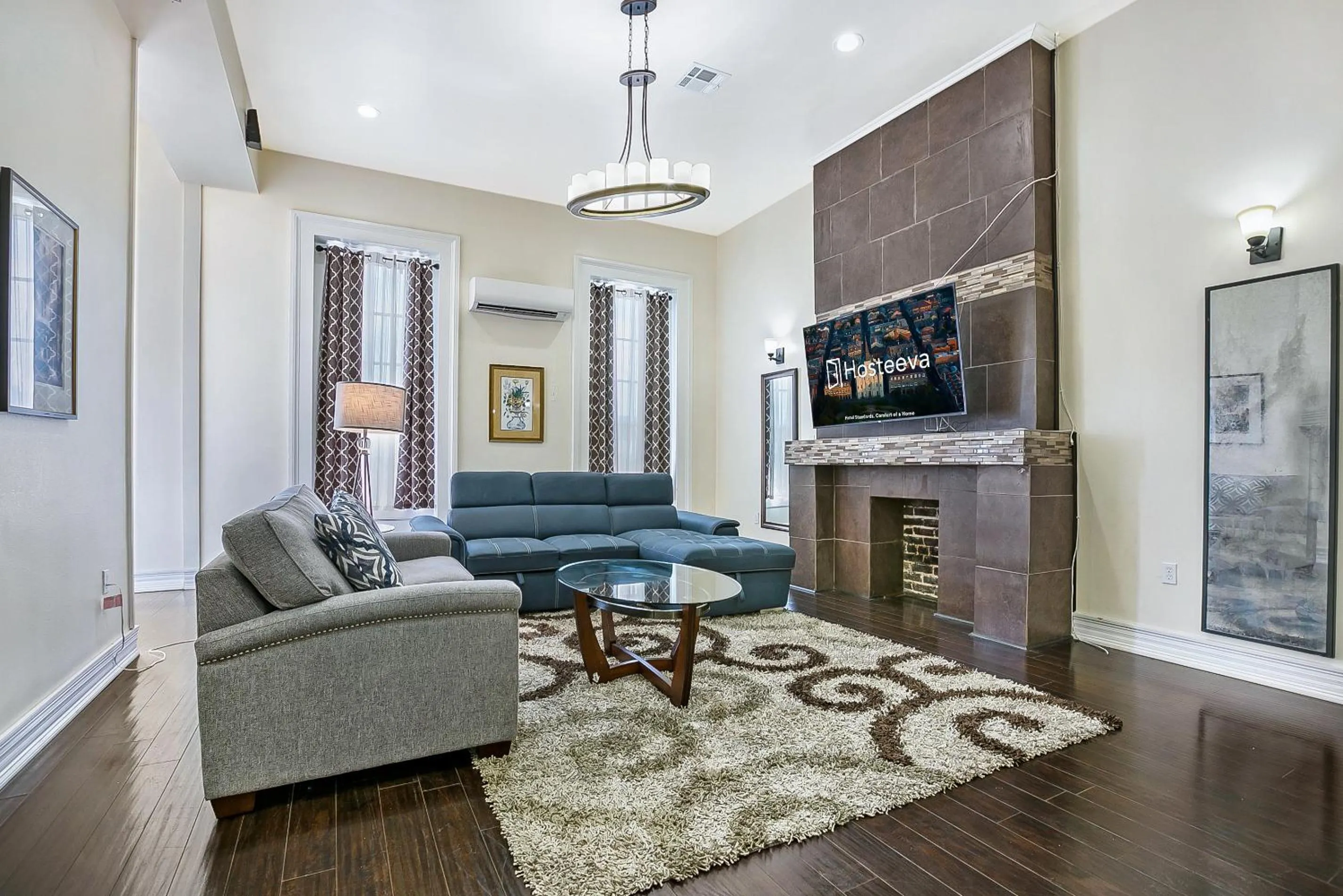 Living room in Stylish 4BR condo in Downtown by Hosteeva