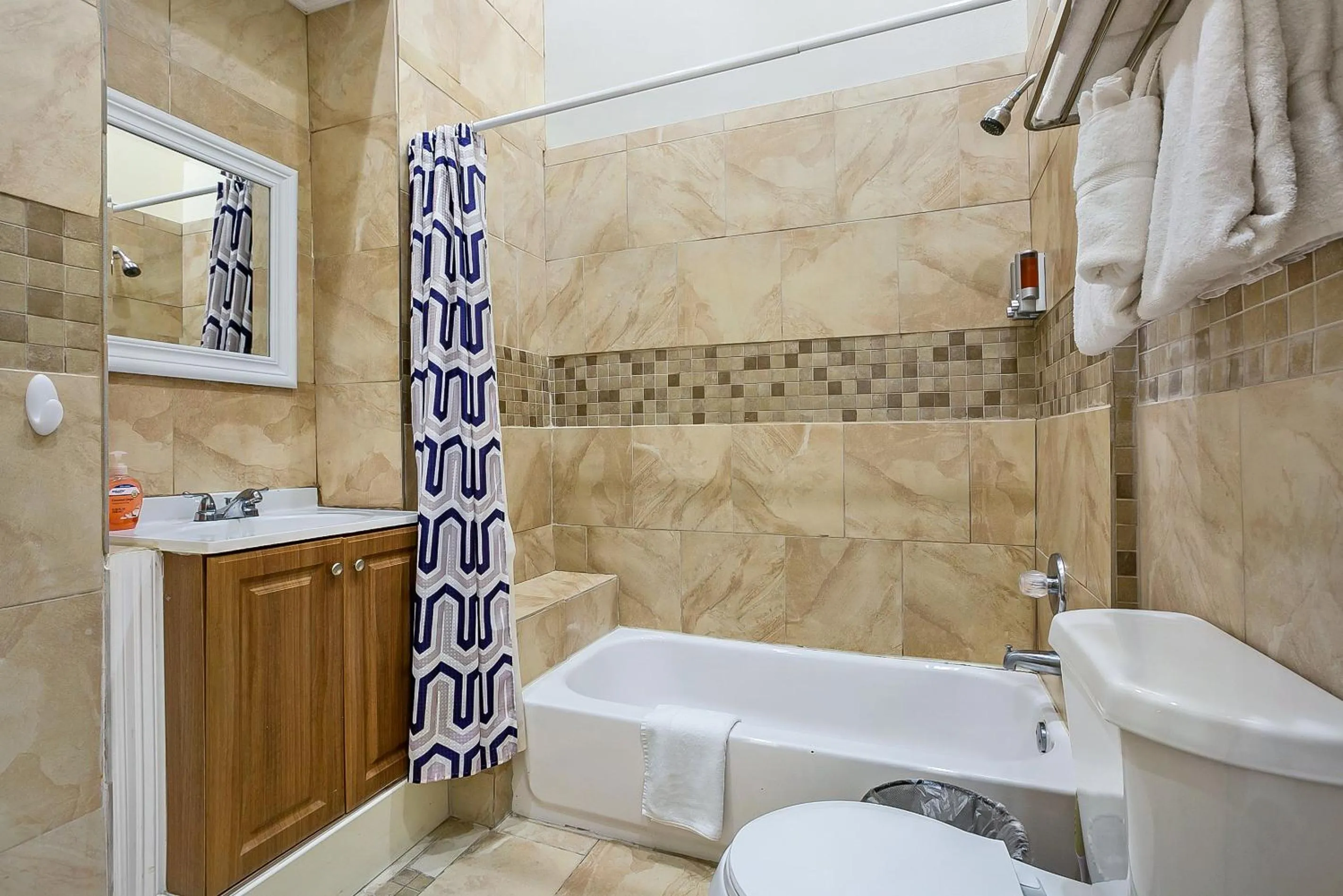 Bedroom in Stylish 4BR condo in Downtown by Hosteeva