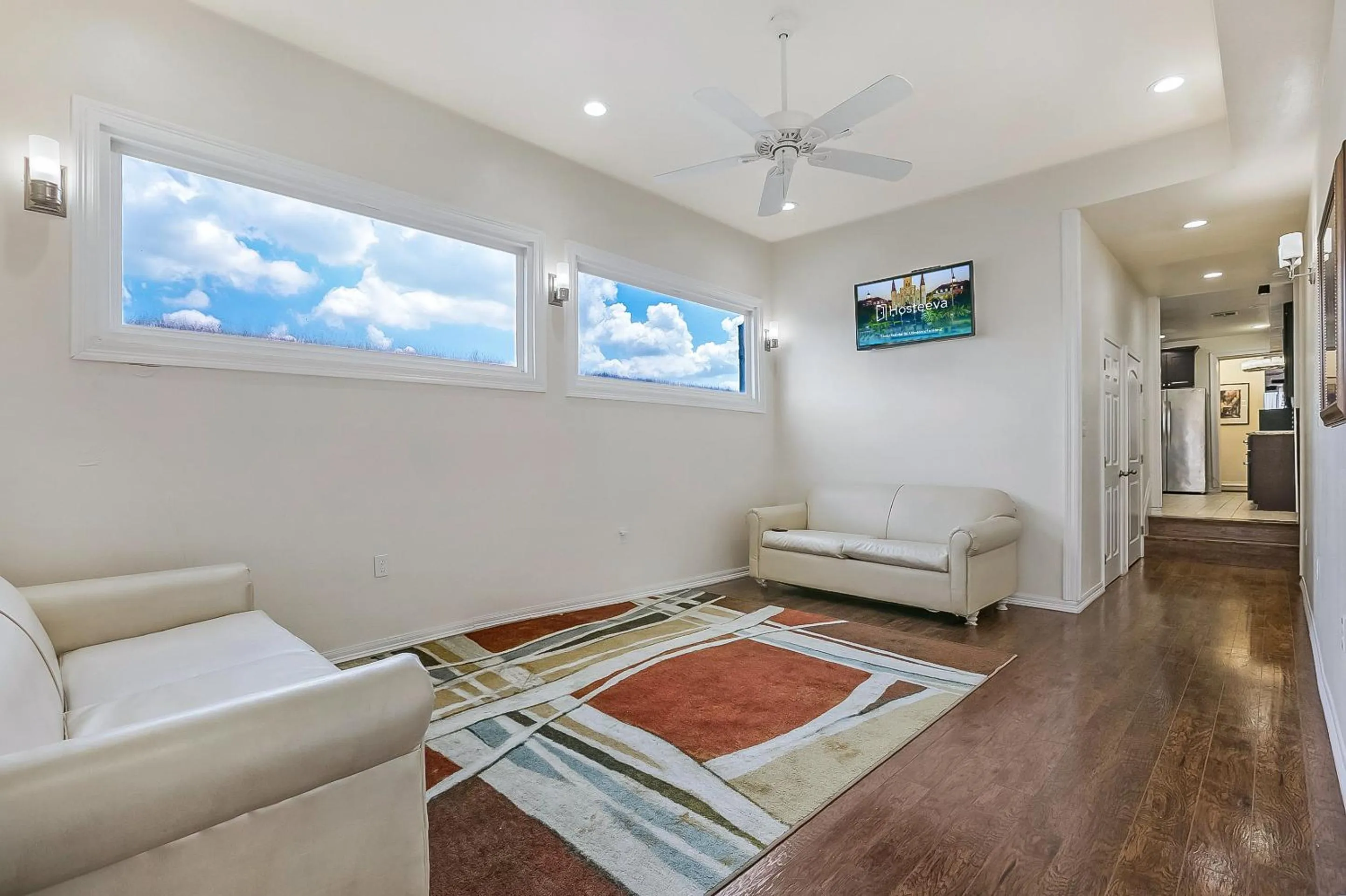 Living room in Modern 4BR Penthouse in Downtown by Hosteeva