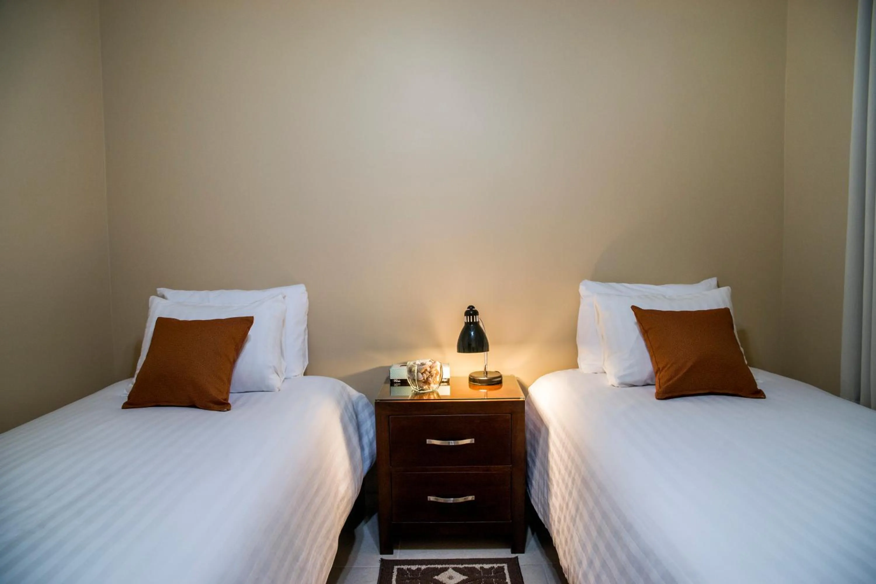 Bed in Bugambilias Suites