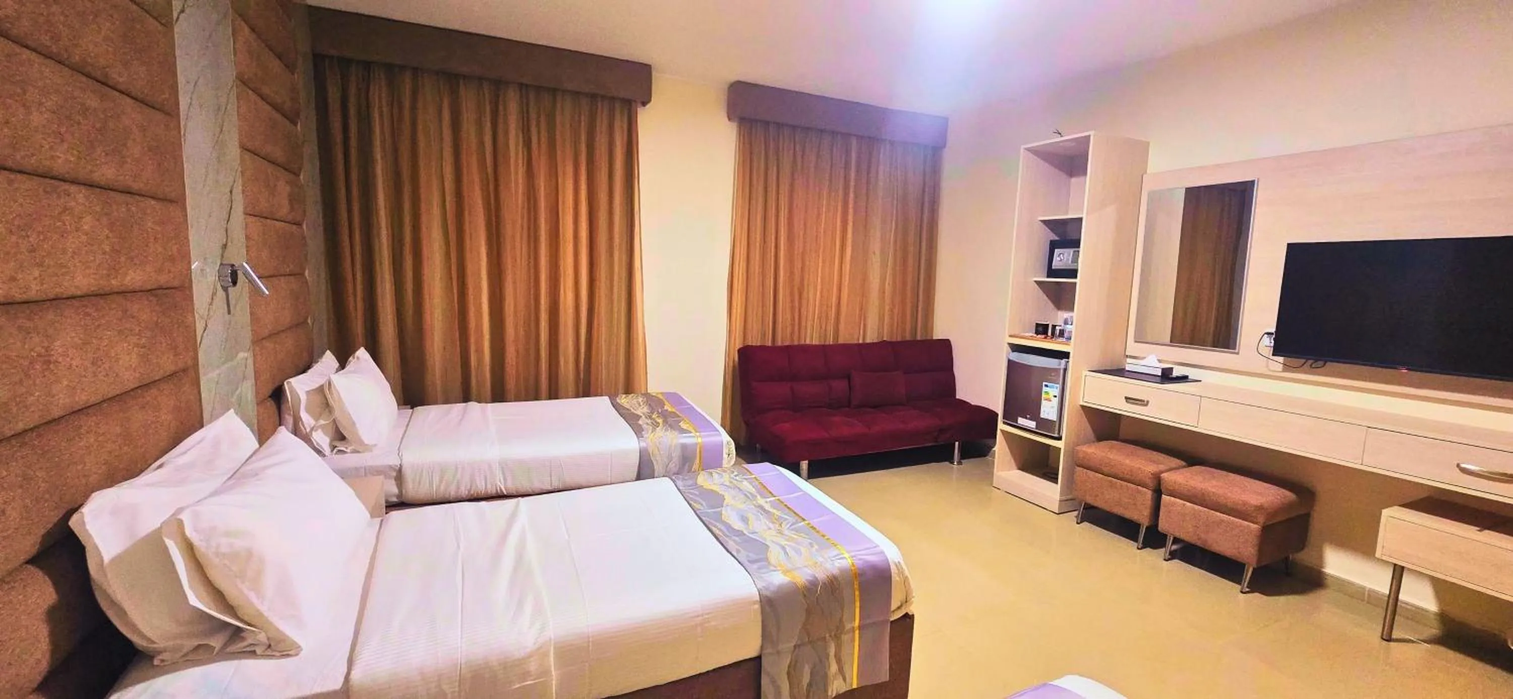 Bed in La Maison Hotel