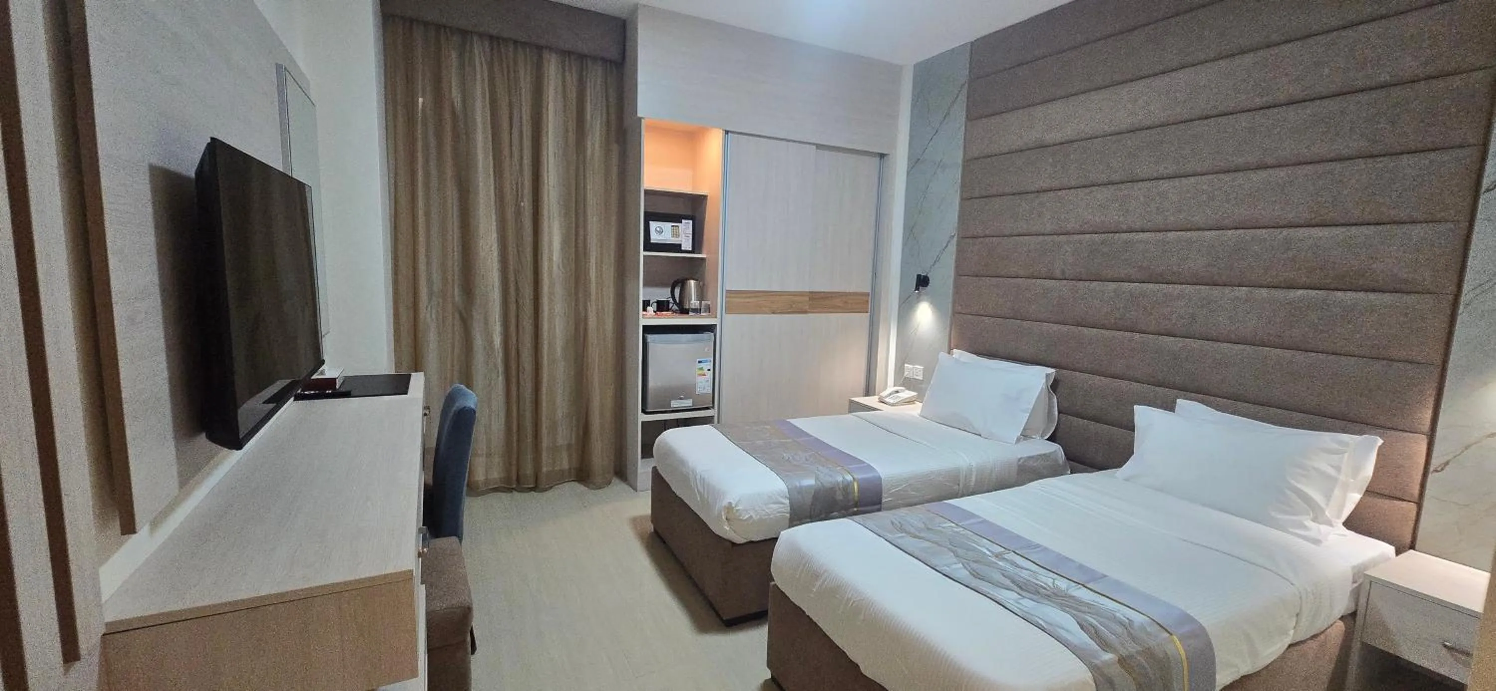 Bed in La Maison Hotel