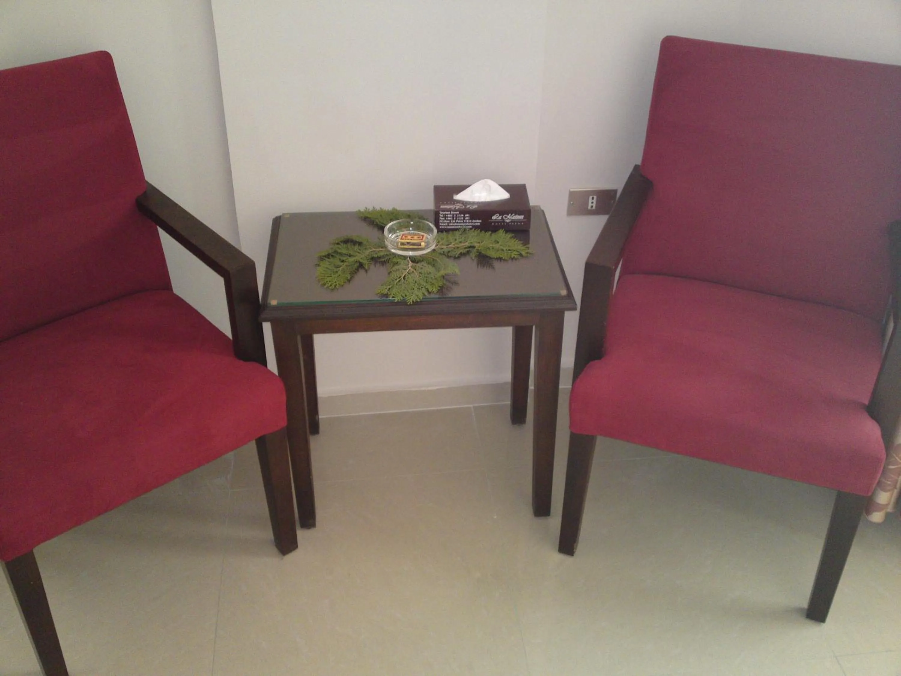 Seating area in La Maison Hotel