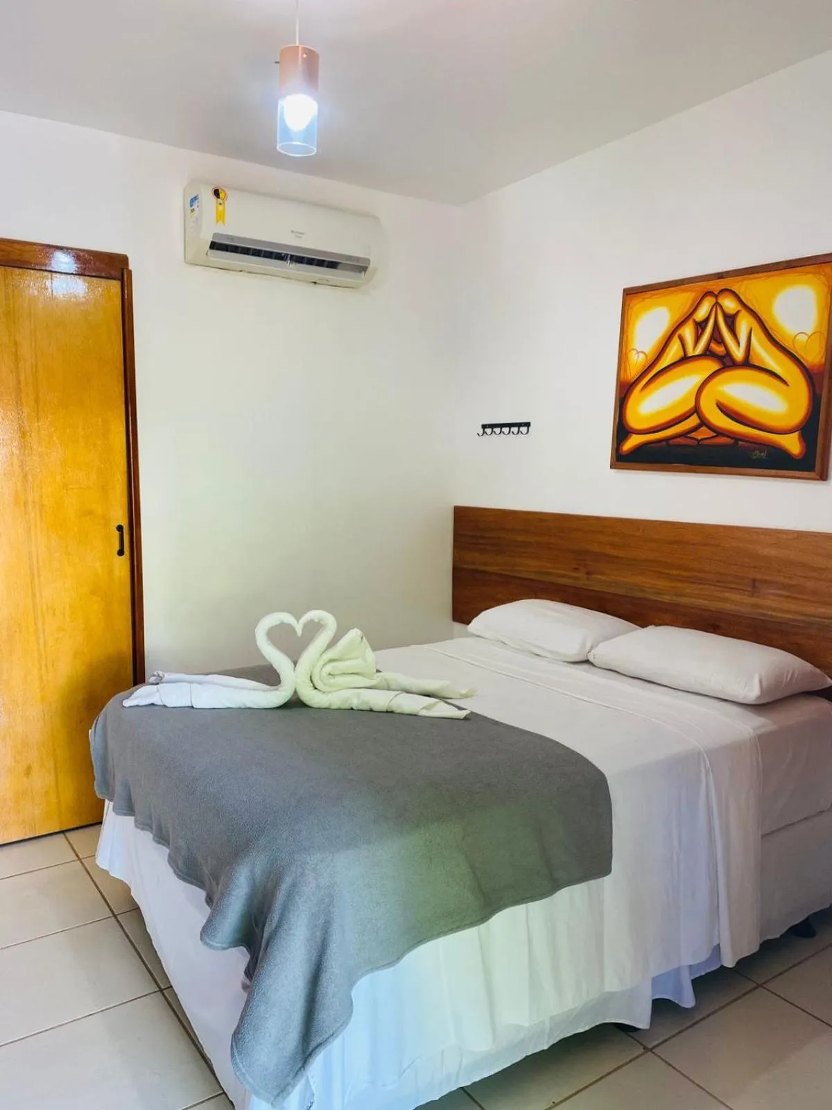 Bed in Pousada Quatro Irmãos