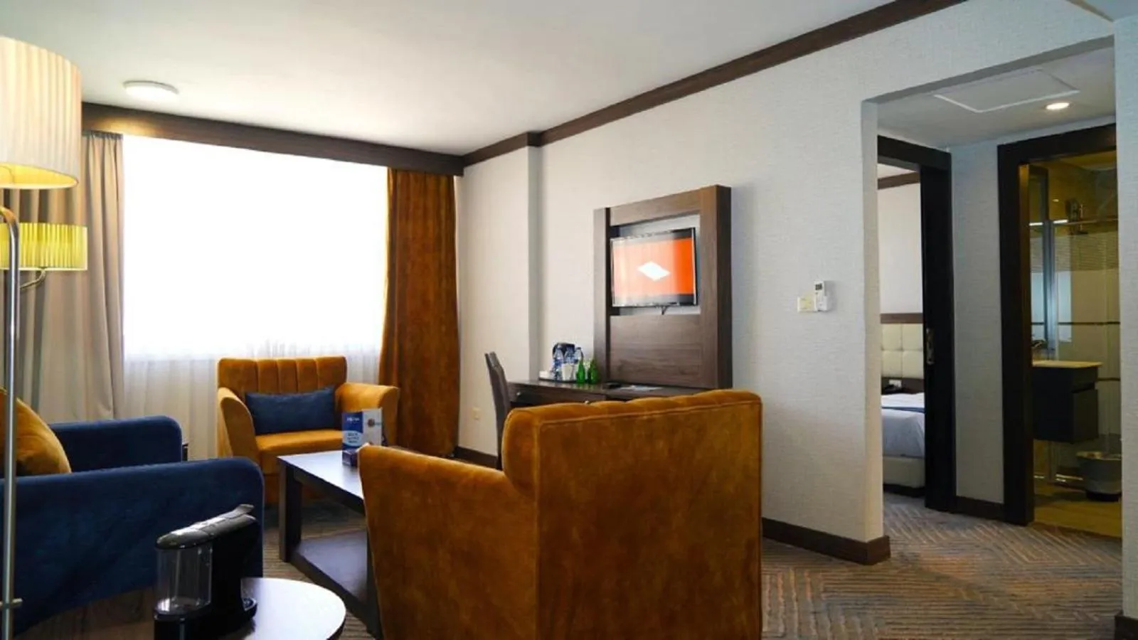 Living room in MENA Tyche Hotel Amman