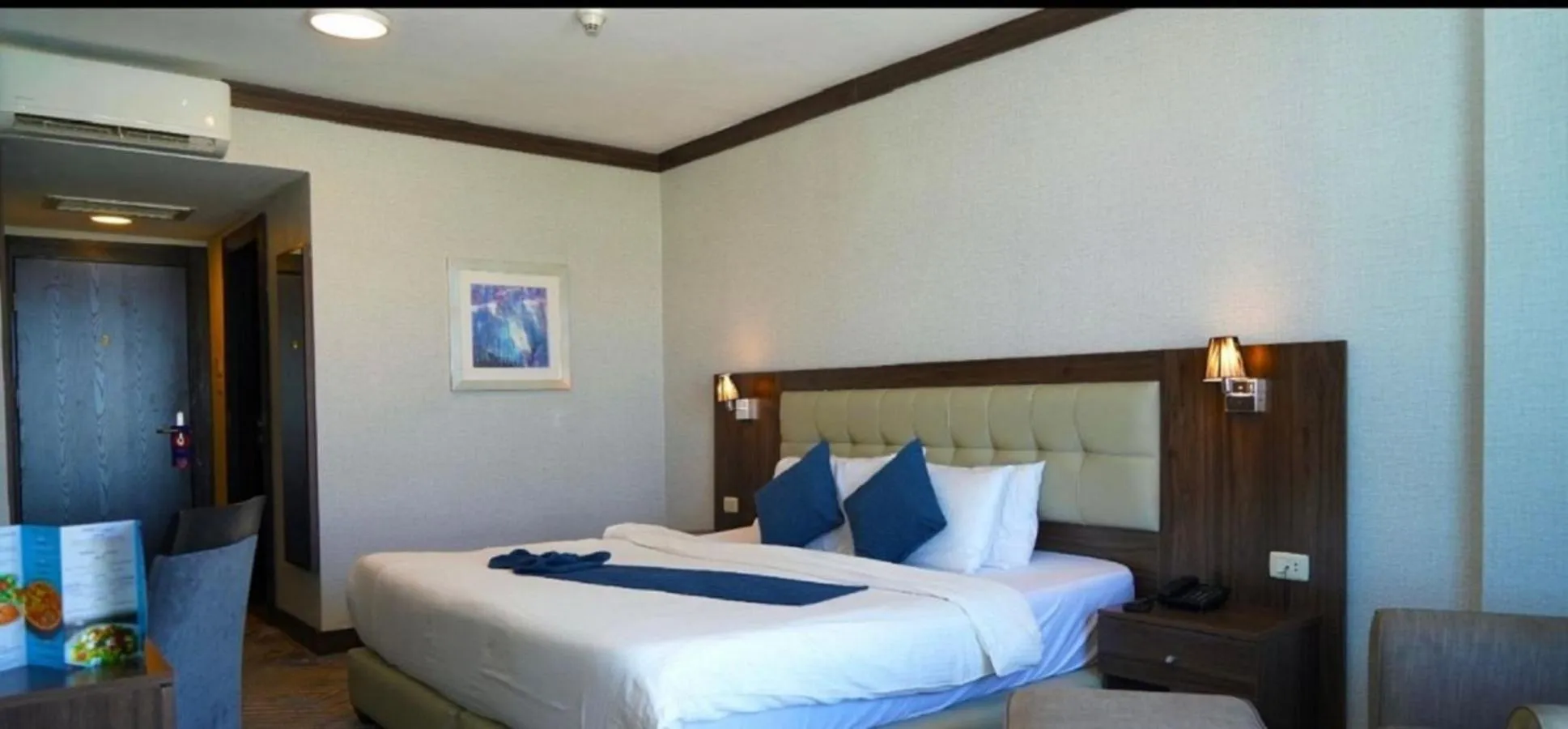 Bed in MENA Tyche Hotel Amman