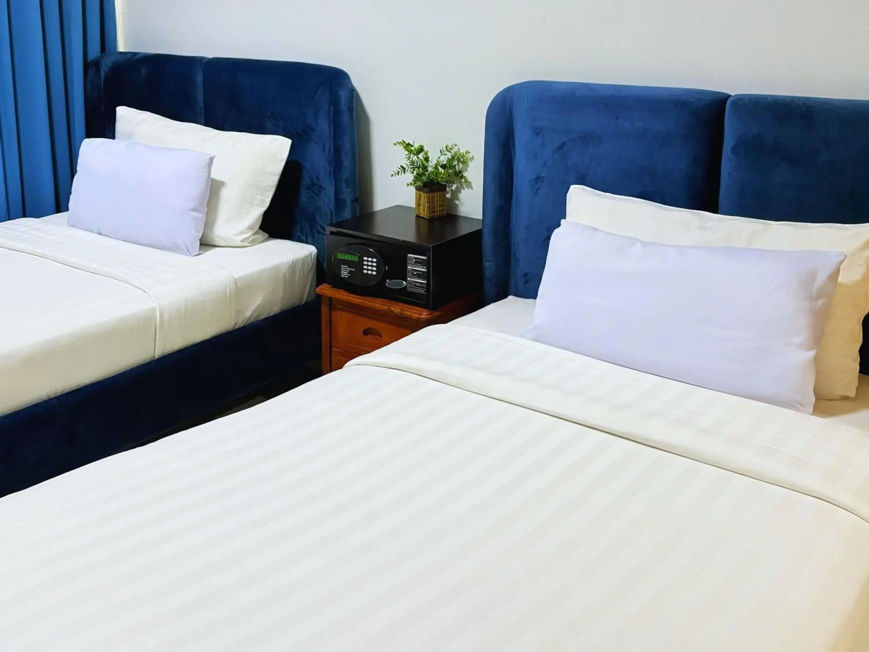 Bed in Pacific Park Hotel Bed in Pacific Park Hotel