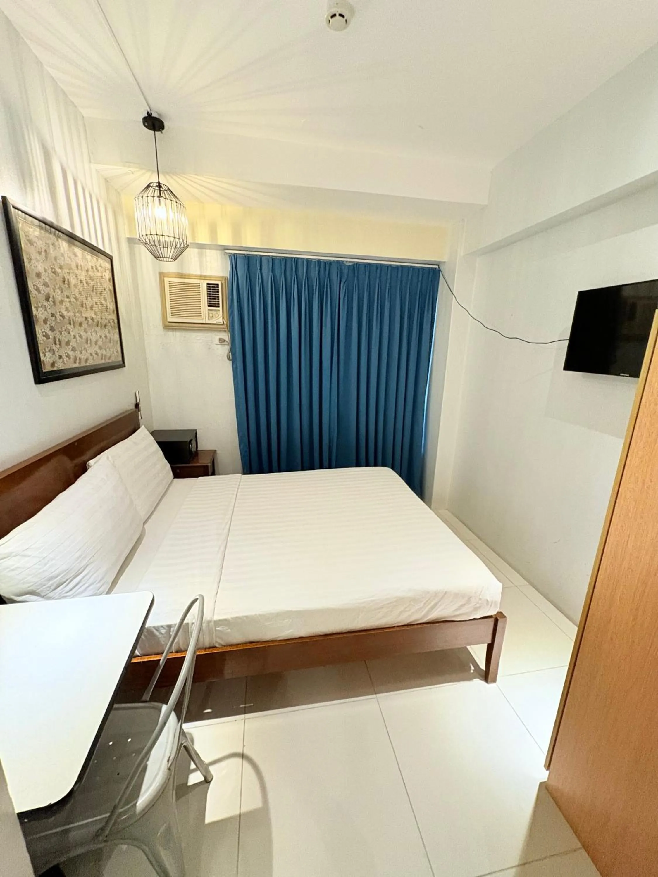 Bed in Pacific Park Hotel