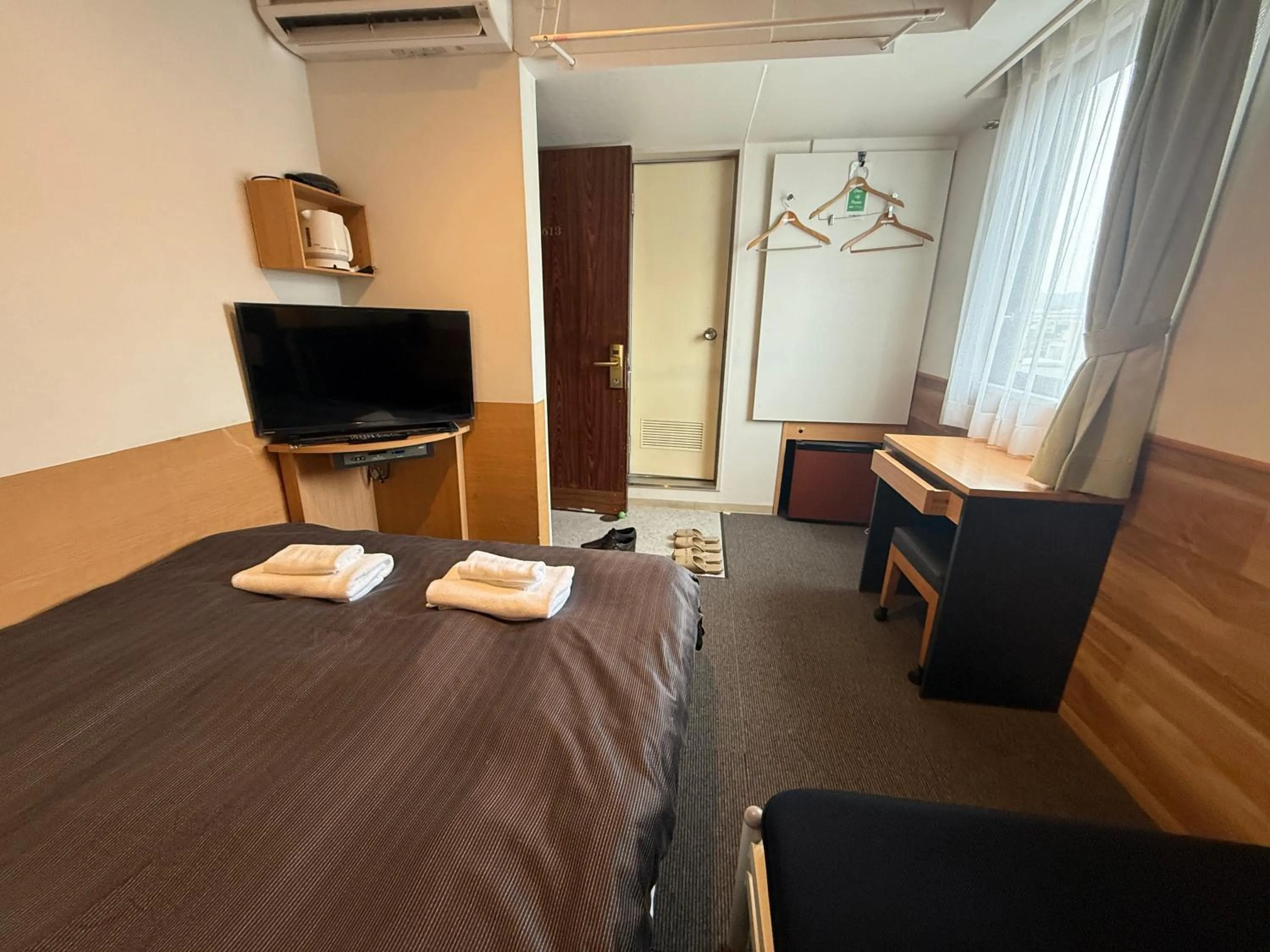 Bedroom in Hotel Kamoike Plaza