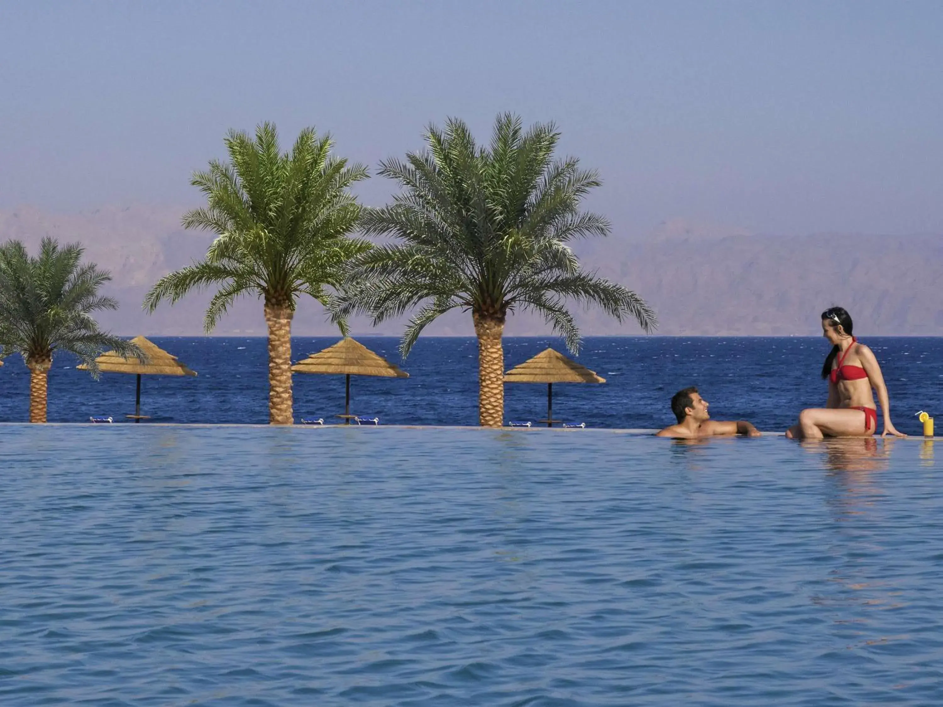 Pool view in Mövenpick Resort & Spa Tala Bay Aqaba Pool view in Mövenpick Resort & Spa Tala Bay Aqaba
