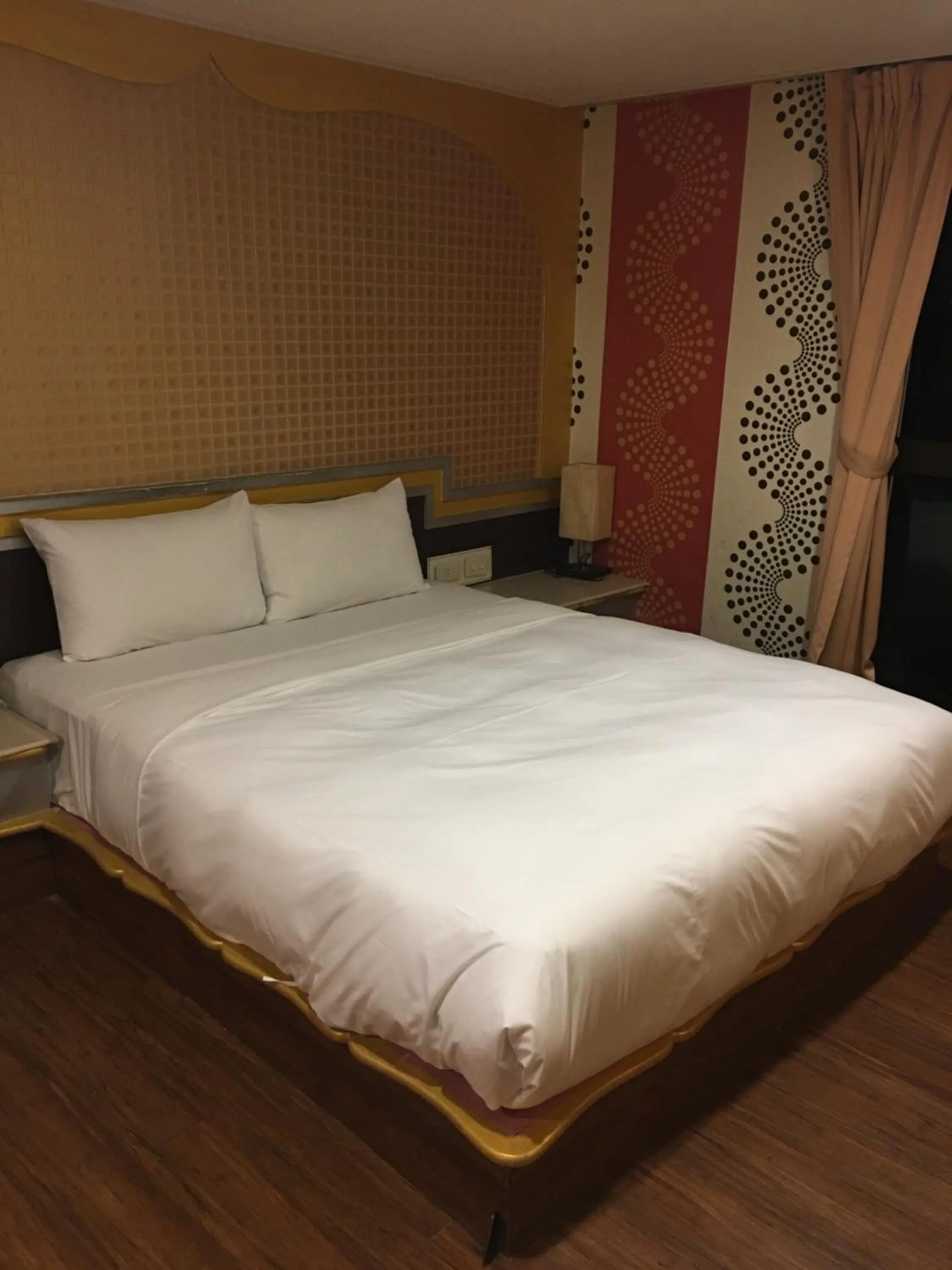 Bed in Jing Dian Business Hotel