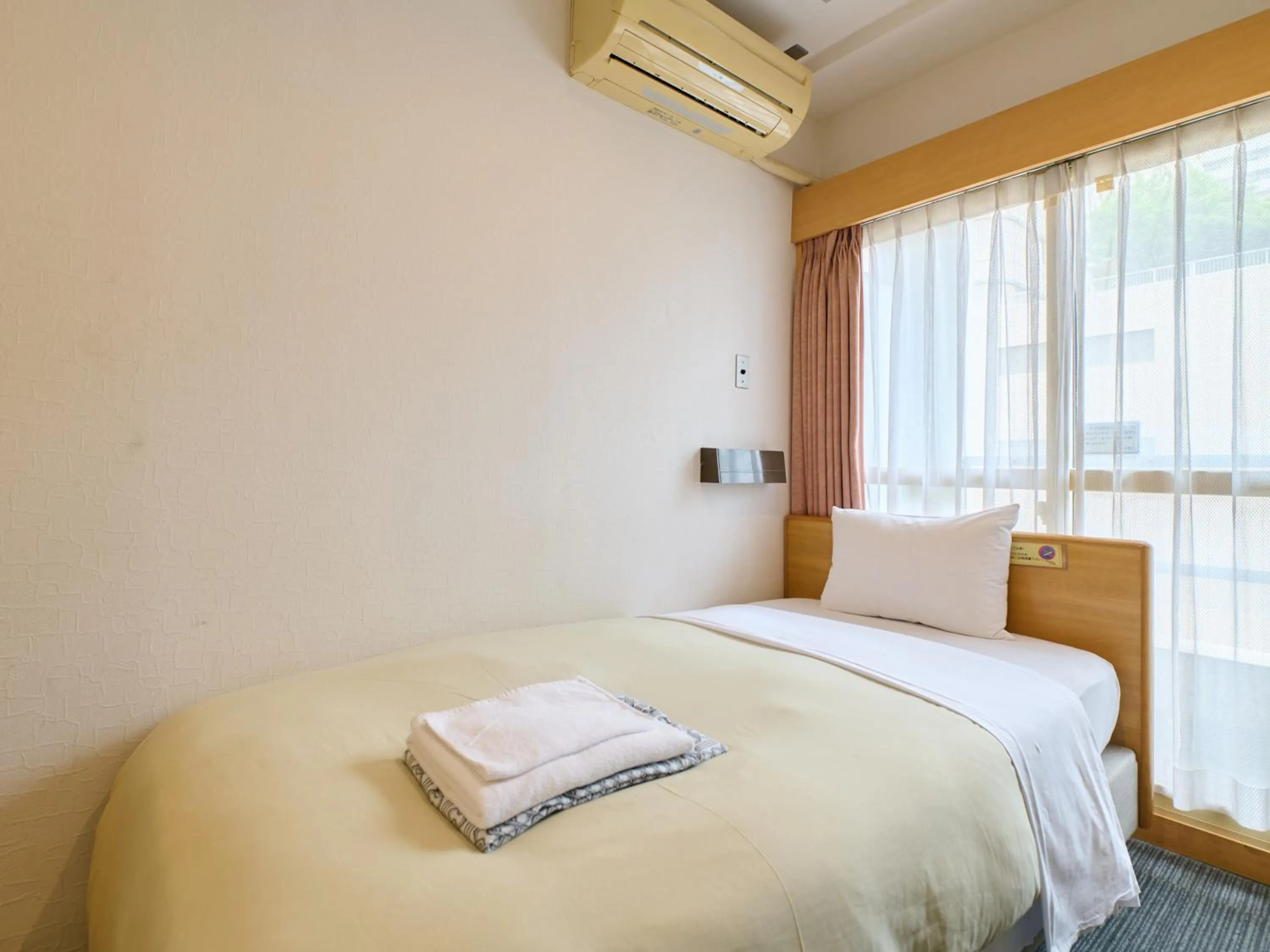 Photo of the whole room, Bed in Tabist Hotel Tetora Ikebukuro