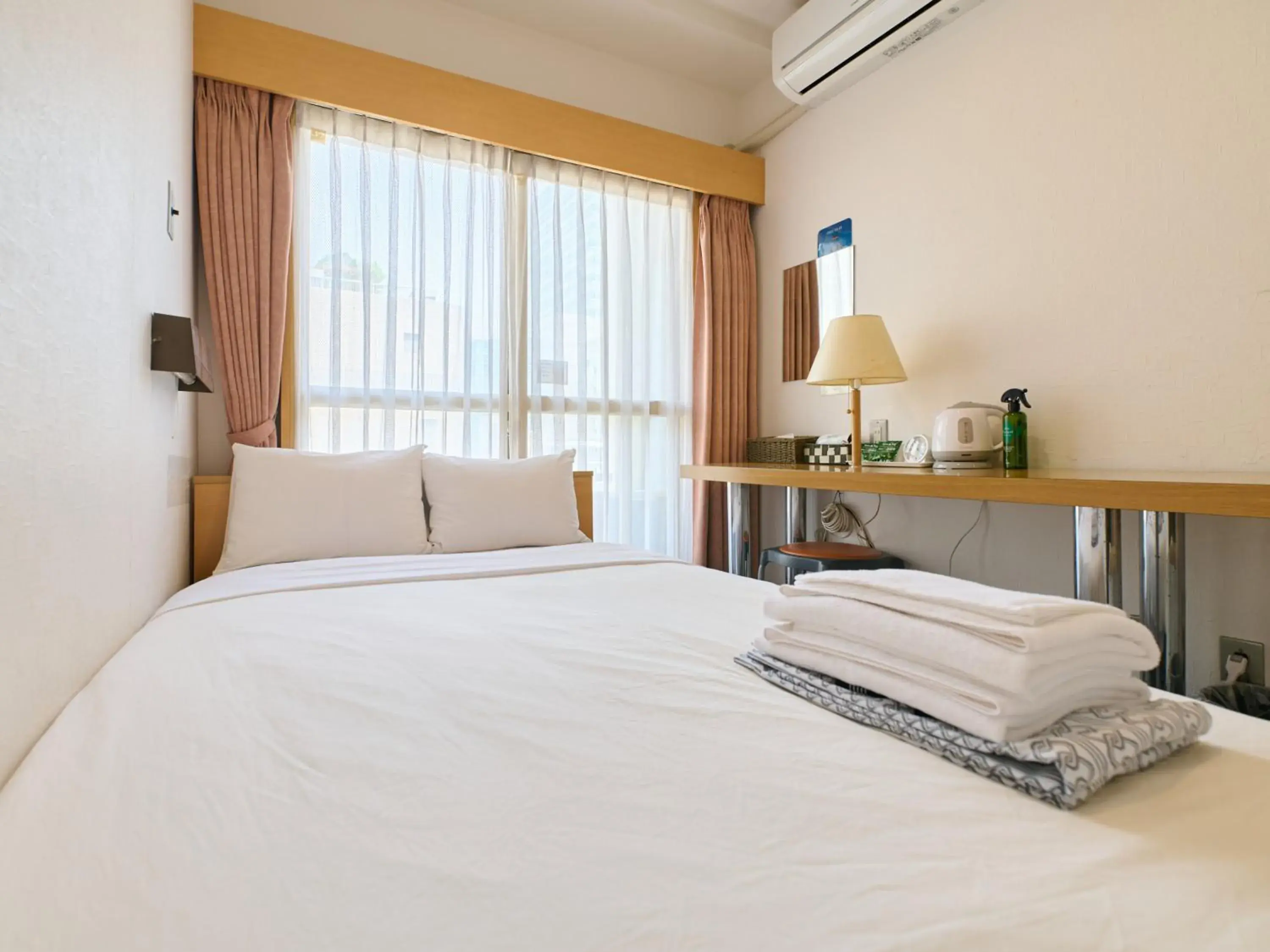 Bed in Tabist Hotel Tetora Ikebukuro Bed in Tabist Hotel Tetora Ikebukuro