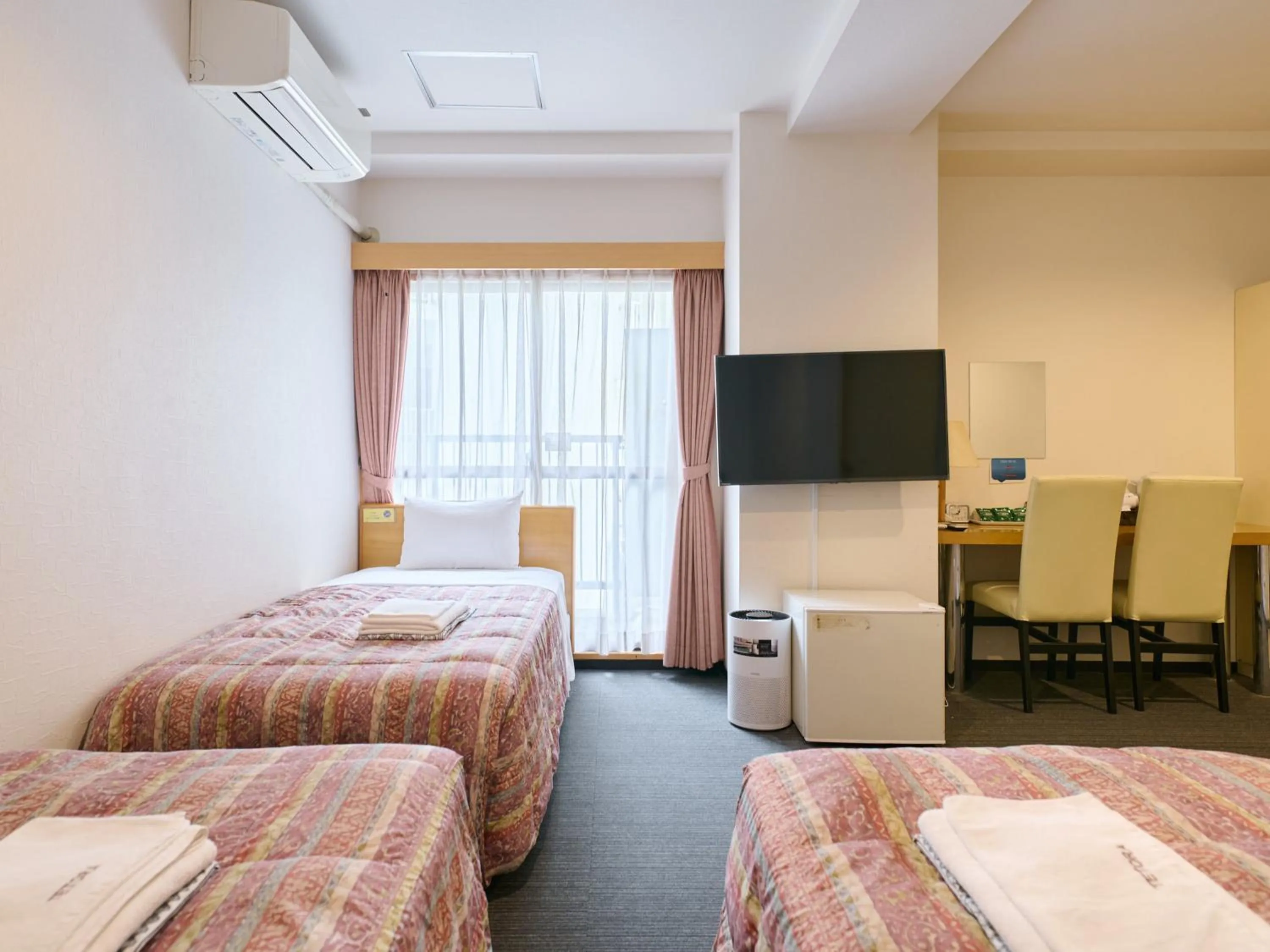 Bed in Tabist Hotel Tetora Ikebukuro