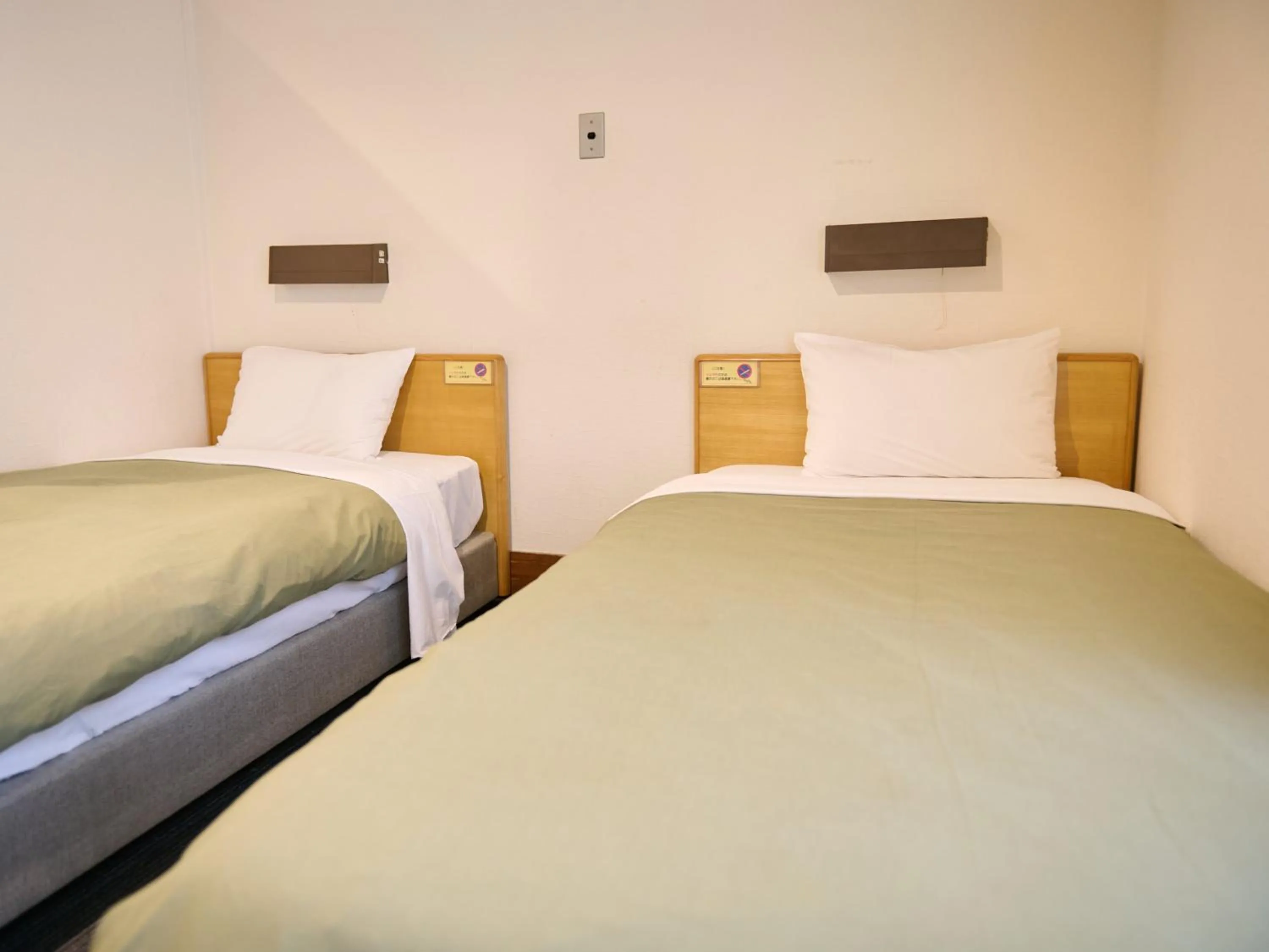 Bed in Tabist Hotel Tetora Ikebukuro