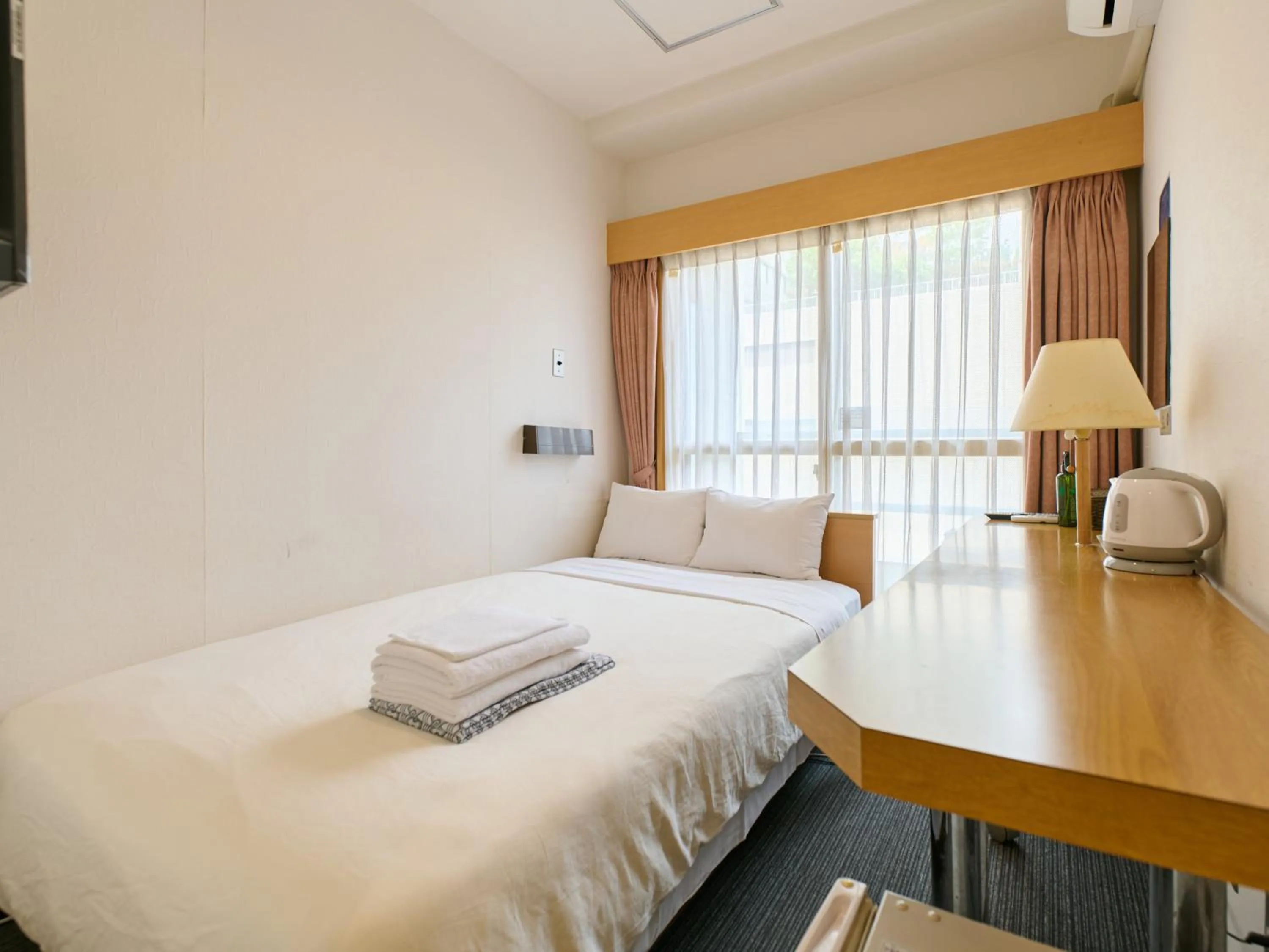 Bed in Tabist Hotel Tetora Ikebukuro