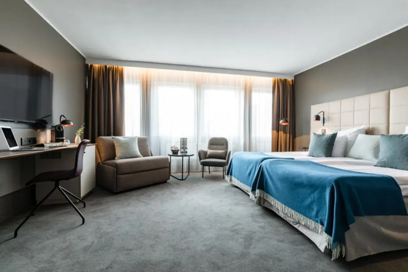 Seating area, Bed in Clarion Hotel Gillet Seating area, Bed in Clarion Hotel Gillet