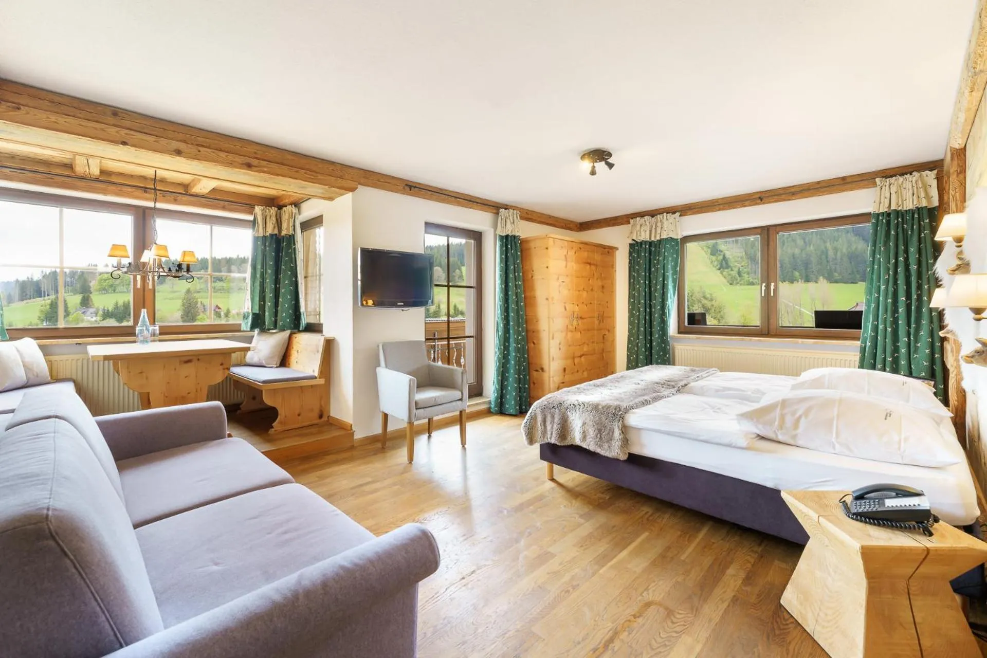 Seating area, Bed in Hotel Schlehdorn