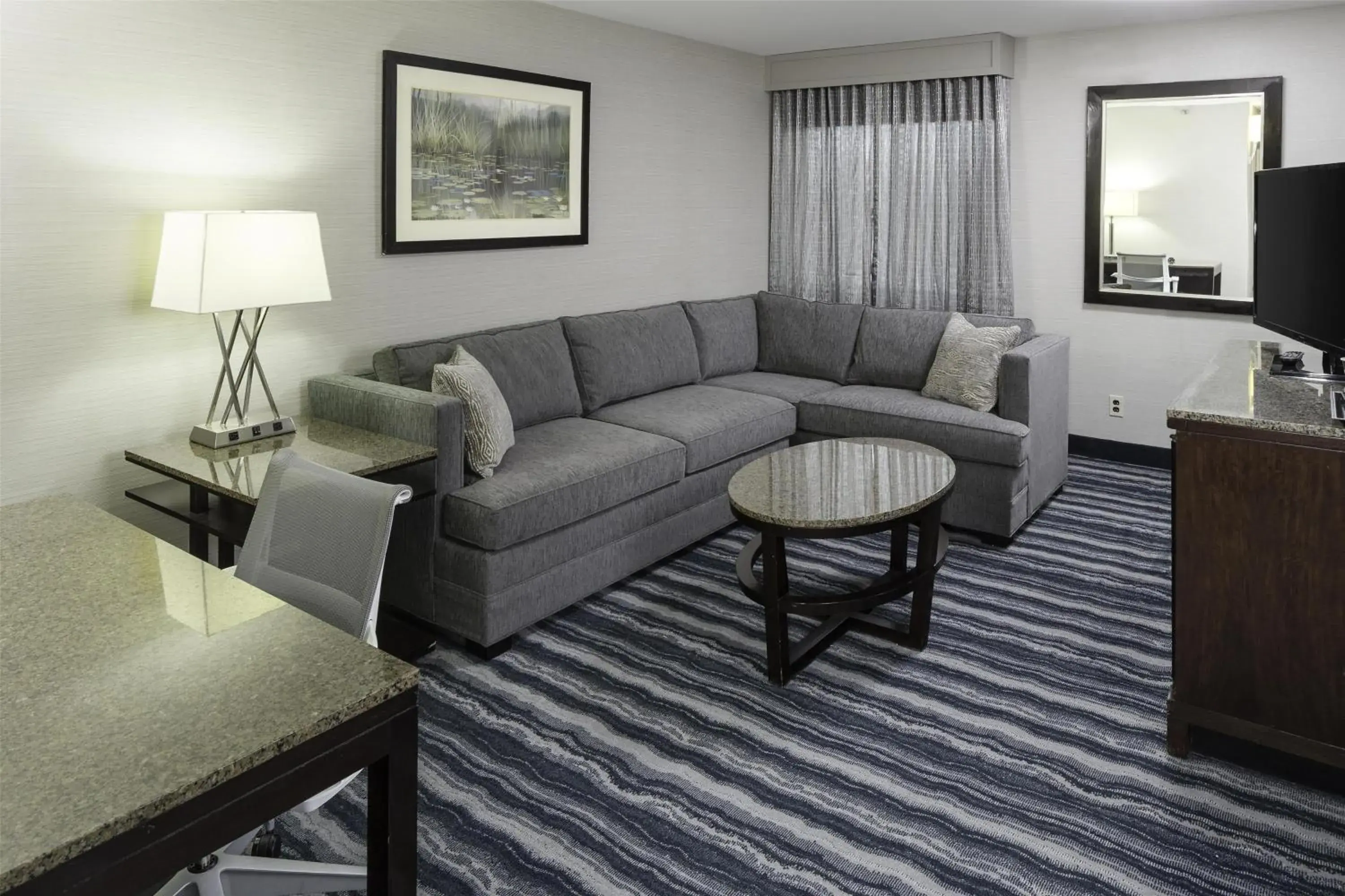 Living room in DoubleTree by Hilton Hotel Wilmington Living room in DoubleTree by Hilton Hotel Wilmington
