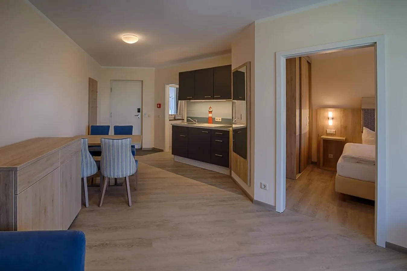 Kitchen or kitchenette, Bed in HAFFHUS - Hotel & Spa