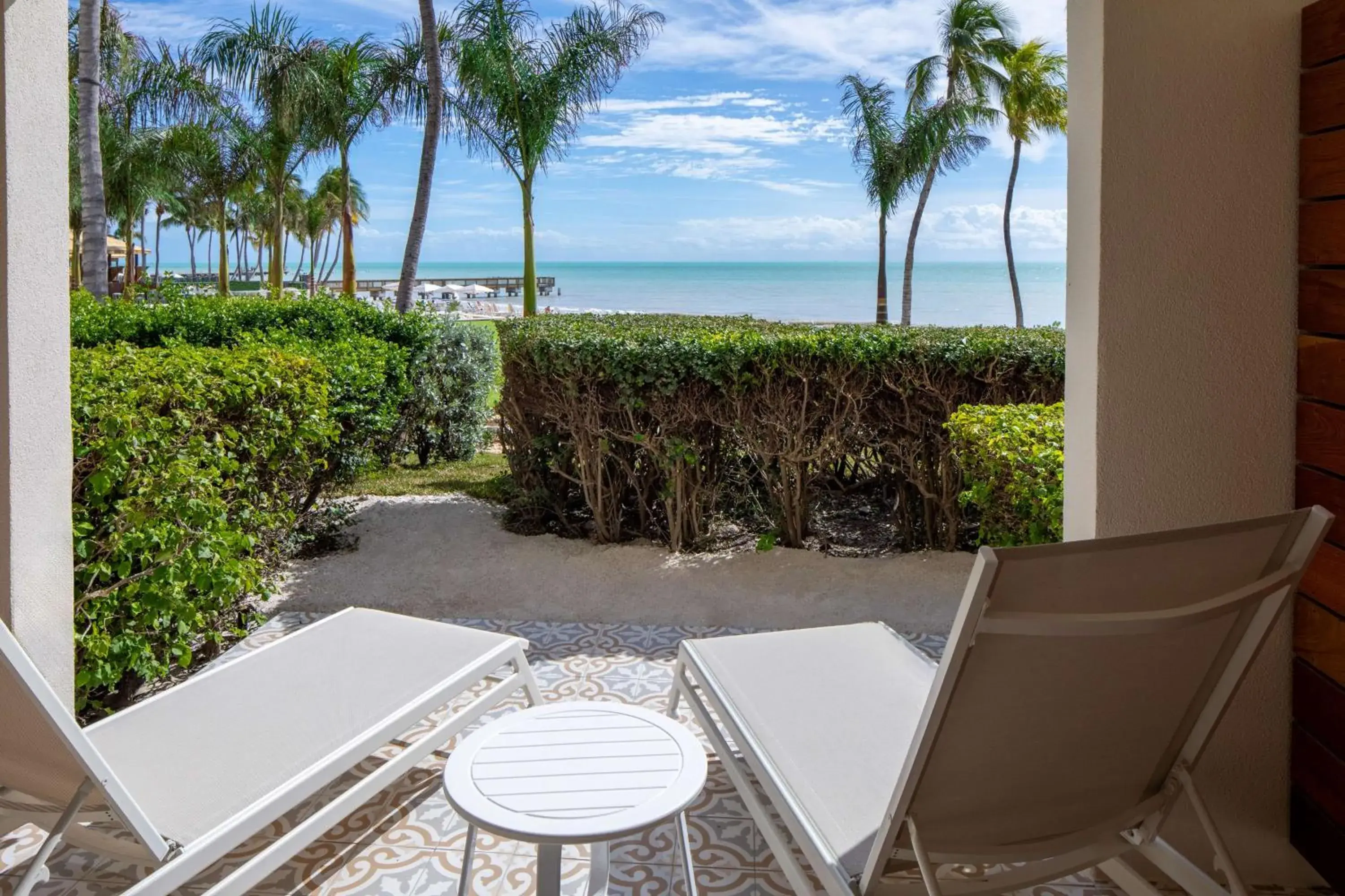 Lanai Queen Room with Two Queen Beds and Ocean View in Casa Marina Key West, Curio Collection by Hilton Lanai Queen Room with Two Queen Beds and Ocean View in Casa Marina Key West, Curio Collection by Hilton