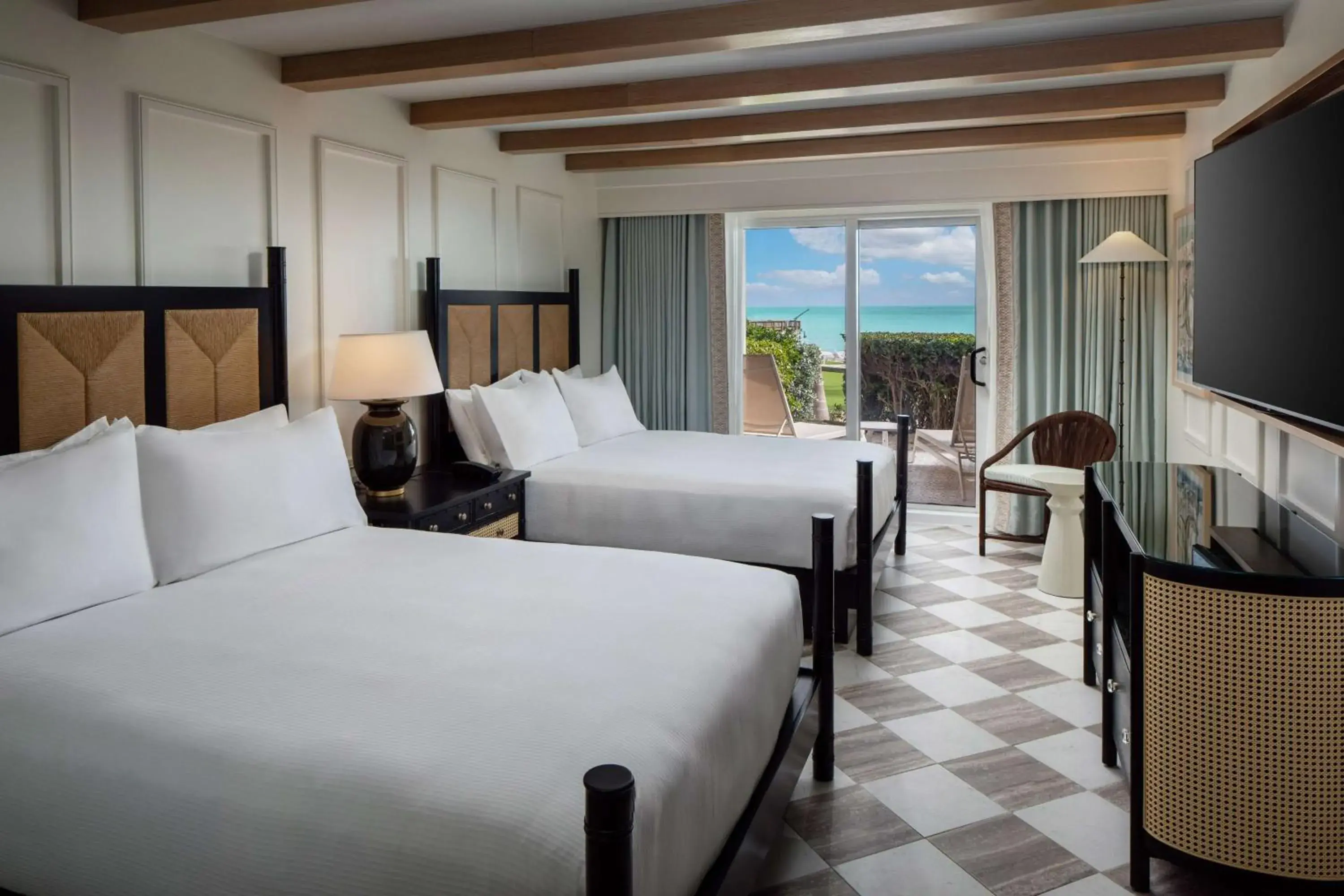 Queen Room with Two Queen Beds - Beachfront Walkout in Casa Marina Key West, Curio Collection by Hilton Queen Room with Two Queen Beds - Beachfront Walkout in Casa Marina Key West, Curio Collection by Hilton