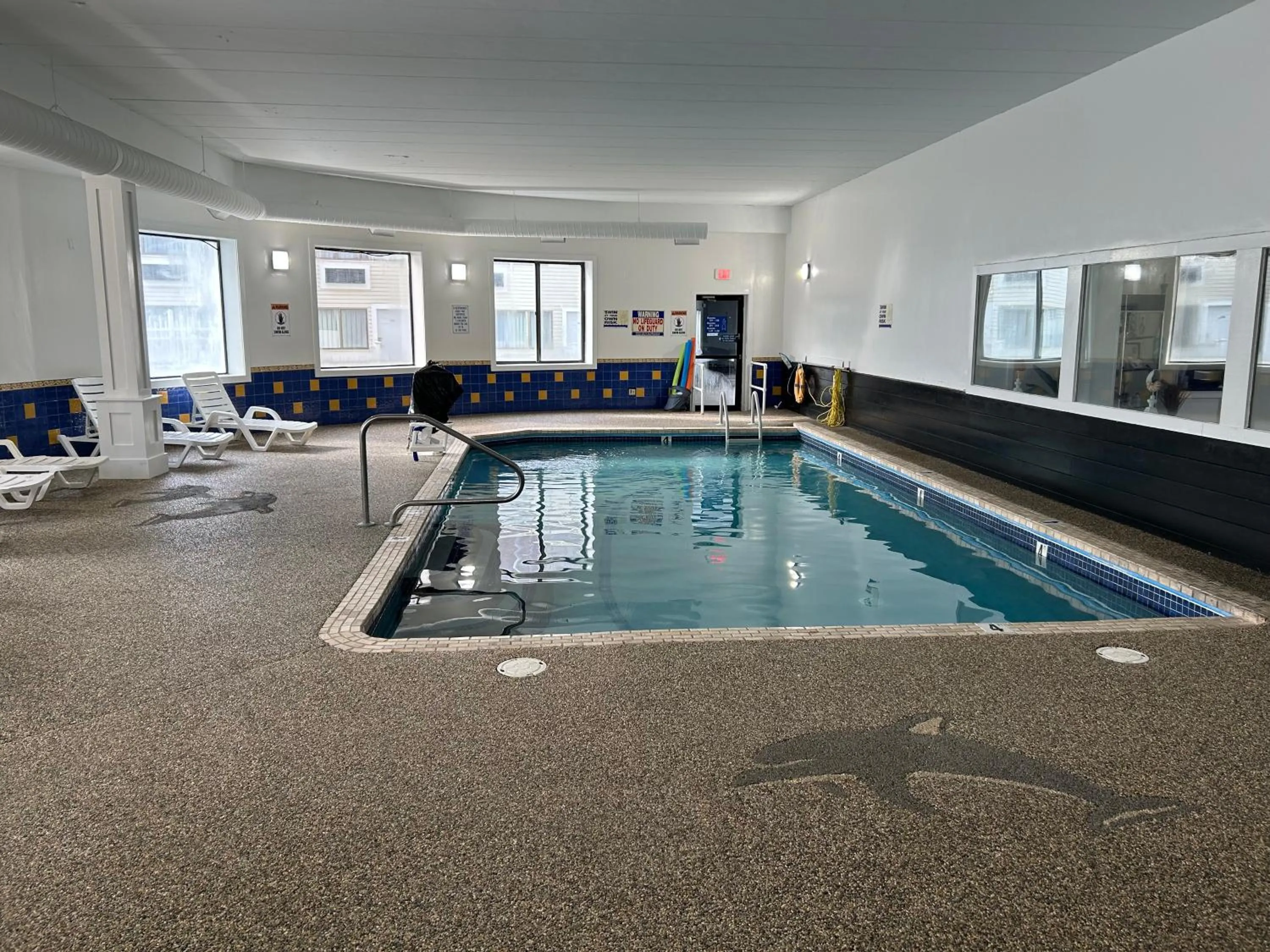 Swimming pool in Admiralty Inn & Suites - a Red Collection Hotel