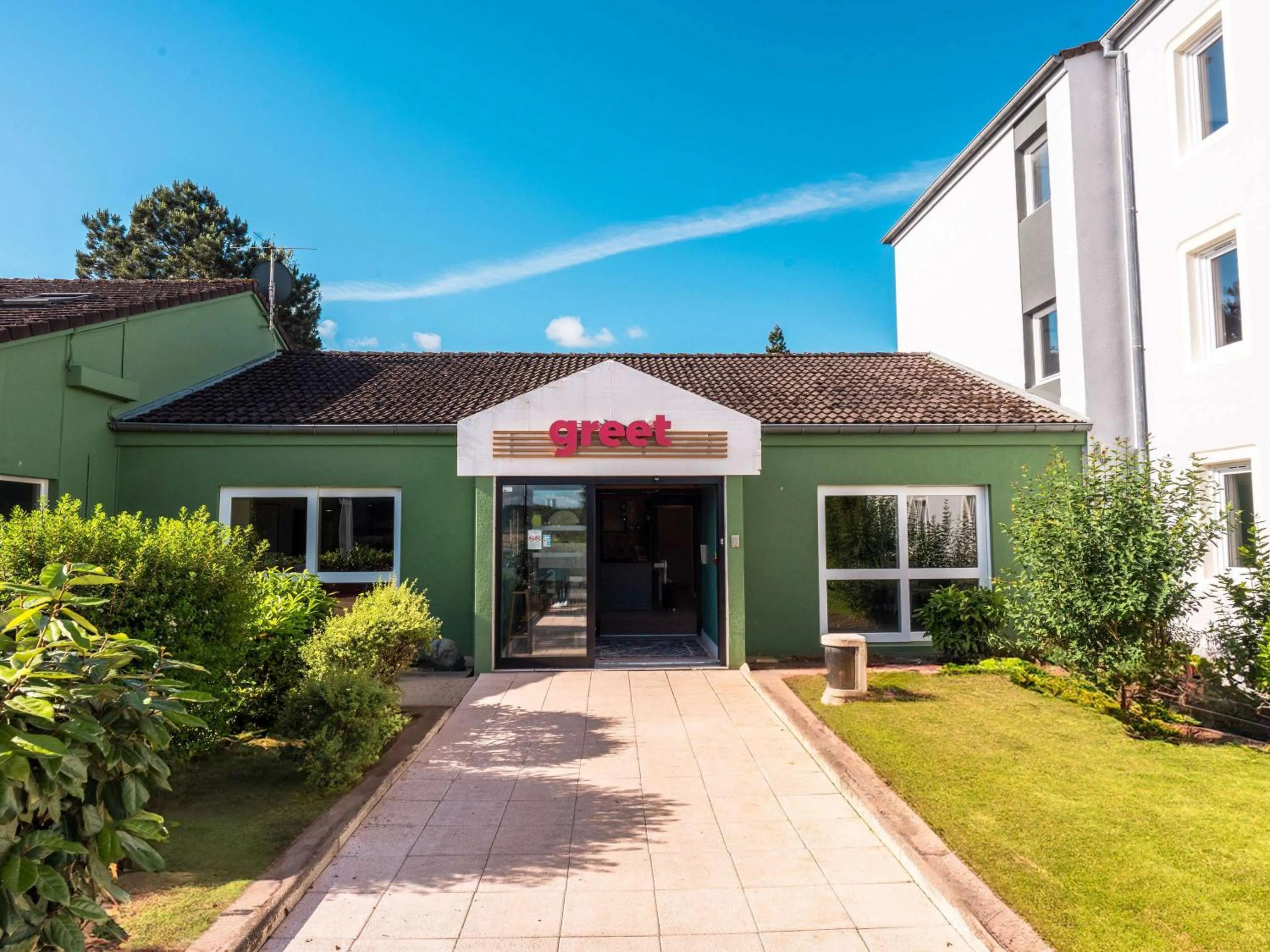 Property building in Hôtel Restaurant Relais Vert - Montbeliard