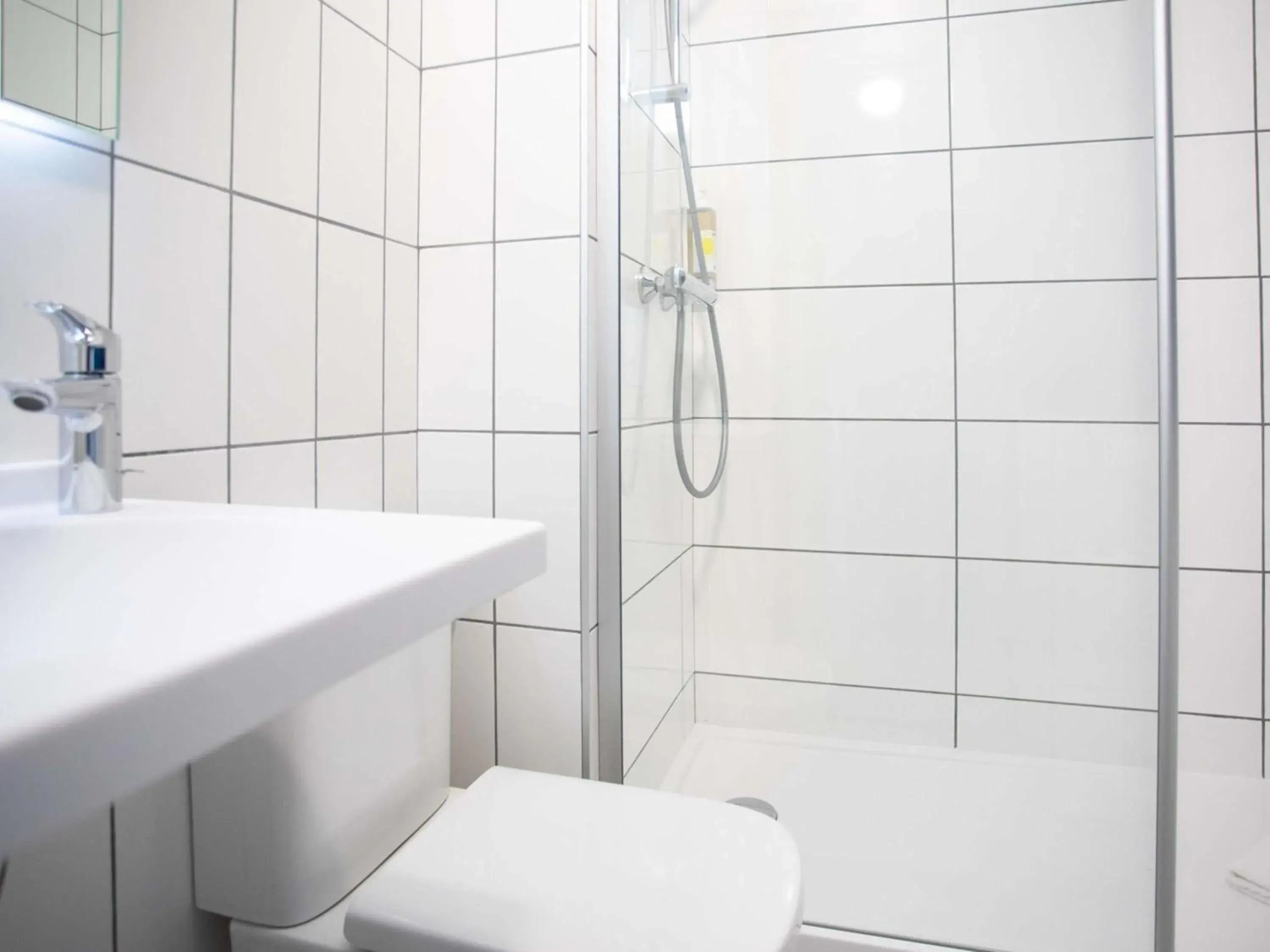 Bedroom in greet Hôtel Montbéliard Bedroom in greet Hôtel Montbéliard