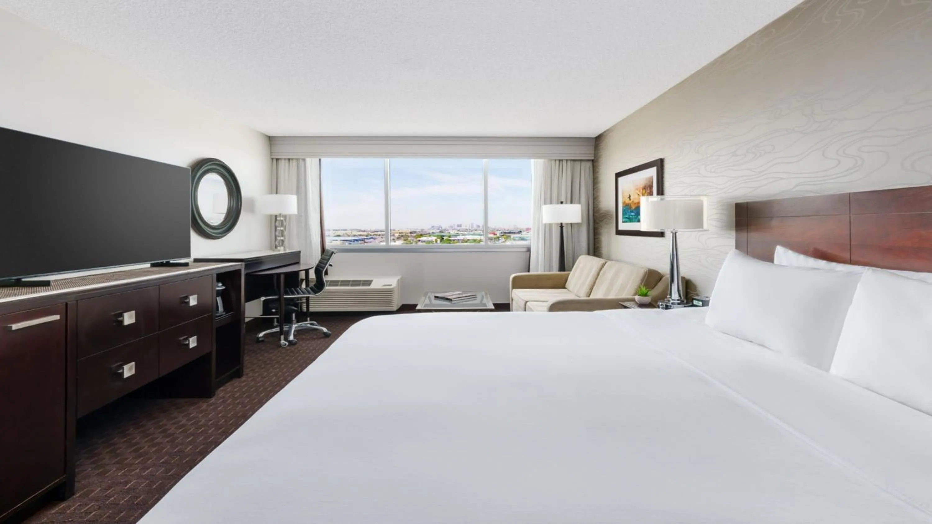 Photo of the whole room, Bed in Crowne Plaza Phoenix Airport - PHX by IHG