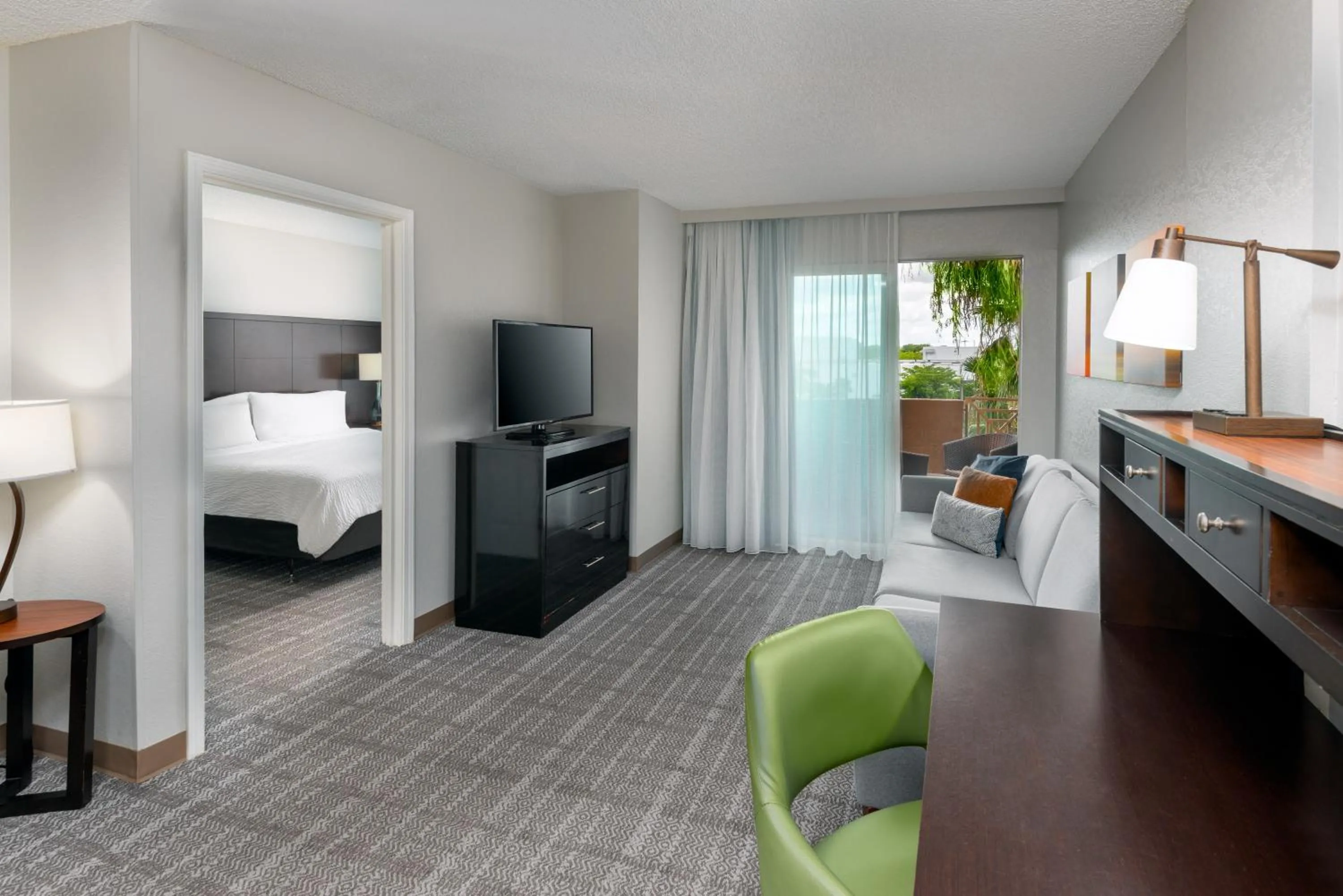 Living room, Bed in Staybridge Suites Miami Doral Area by IHG