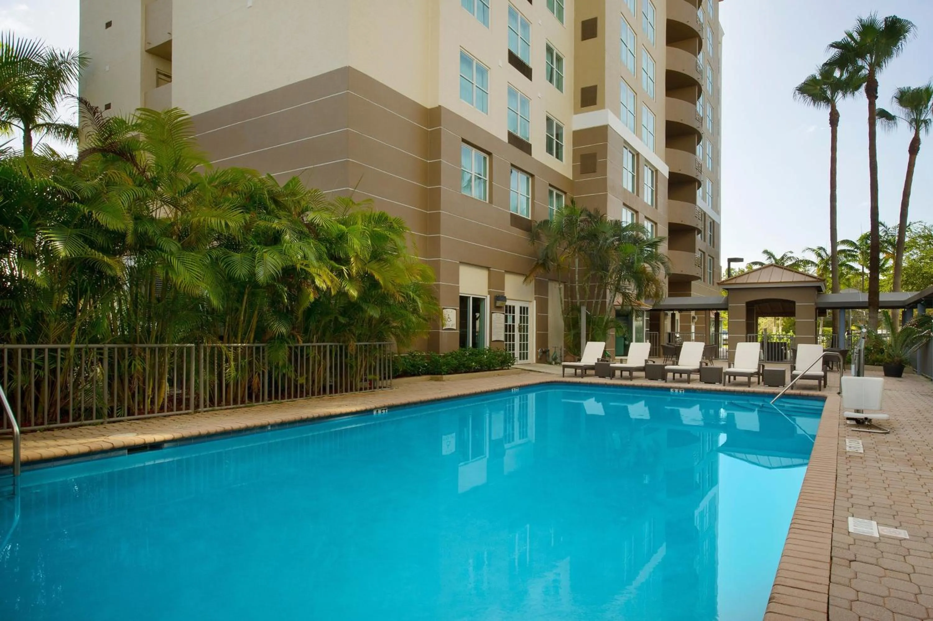 Swimming pool in Staybridge Suites Miami Doral Area by IHG