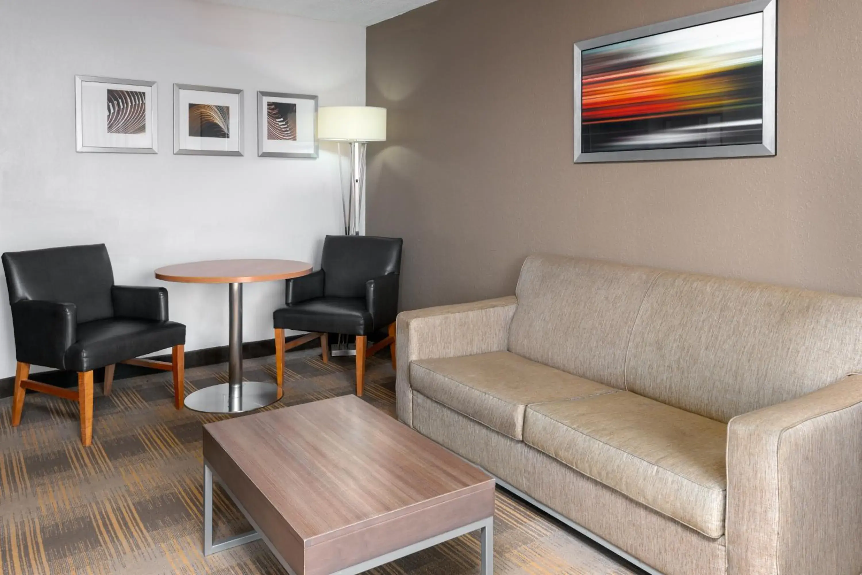 Living room in Holiday Inn Miami-Doral Area by IHG Living room in Holiday Inn Miami-Doral Area by IHG
