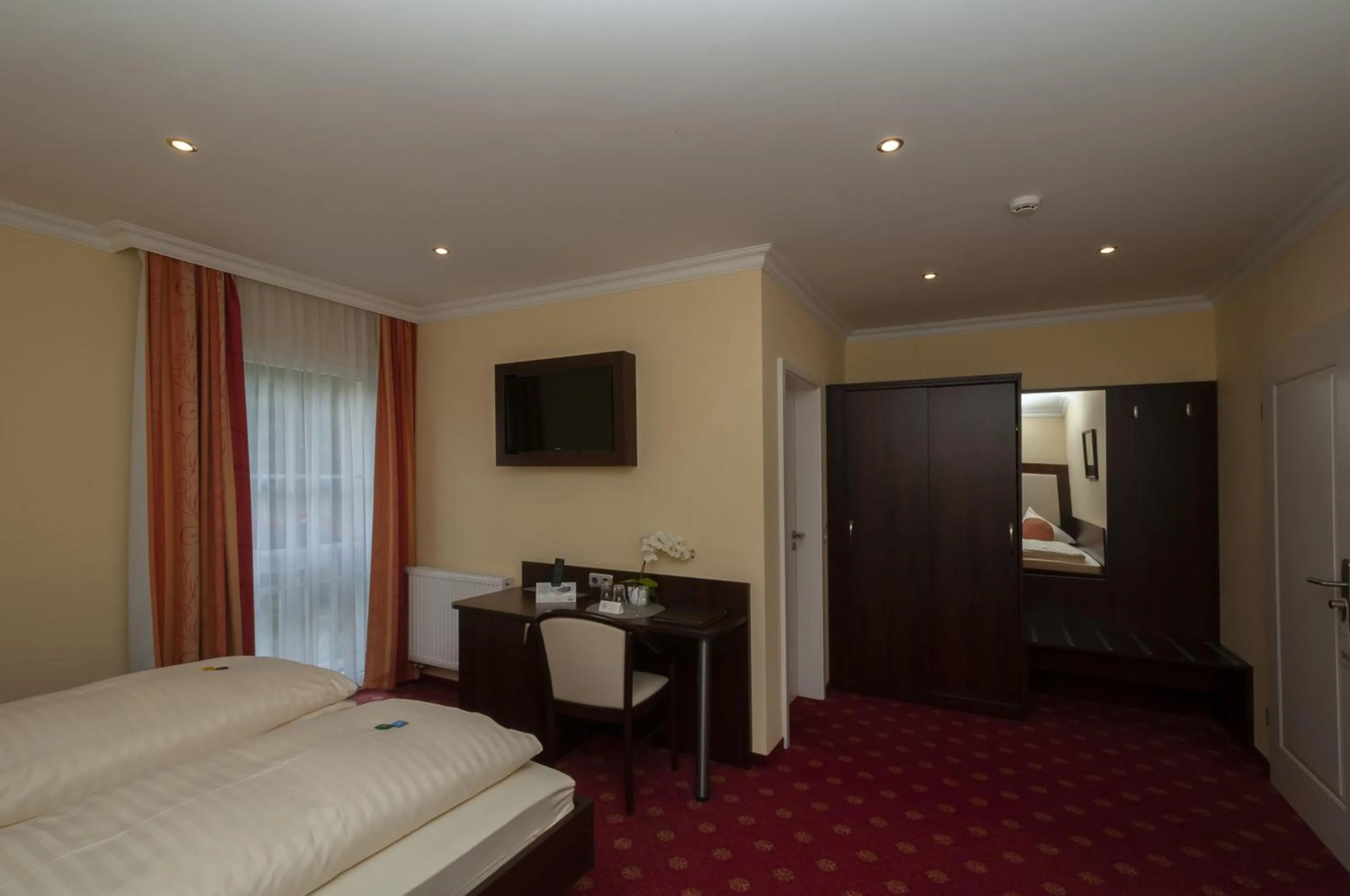 Photo of the whole room, Bed in Hotel Grüne Tanne