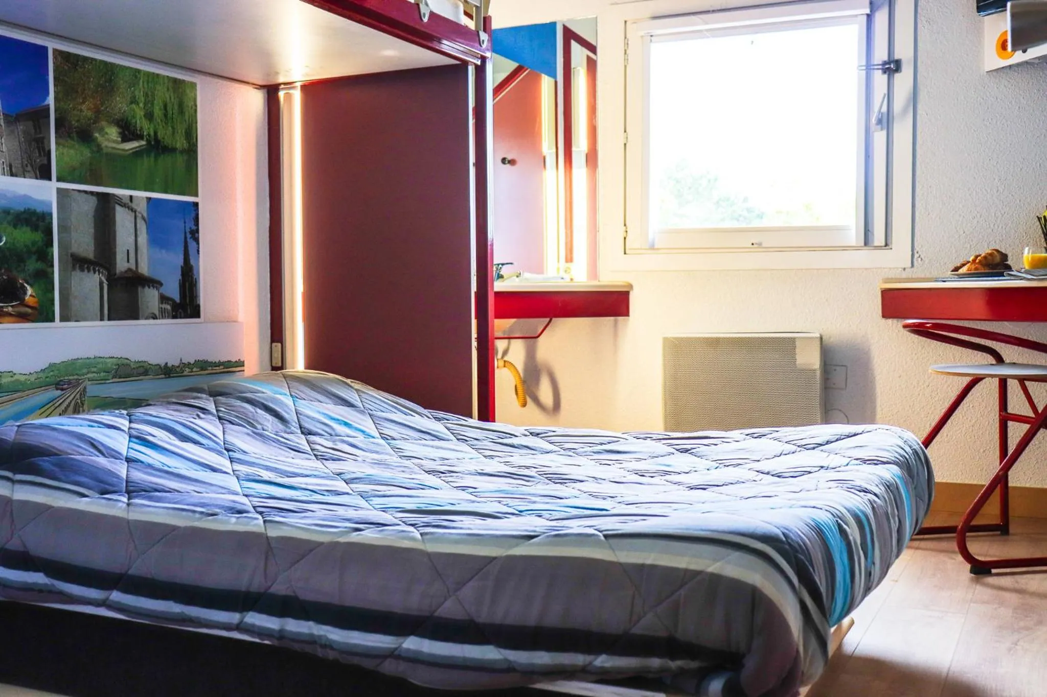 Photo of the whole room, Bed in Hoteleco Sud Agen Autoroute