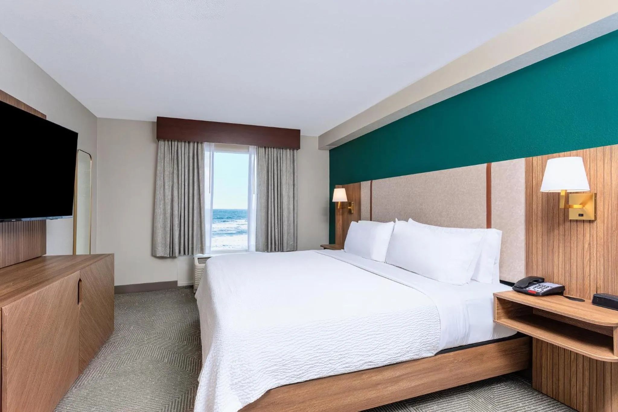 Photo of the whole room, Bed in Holiday Inn Hotel & Suites Daytona Beach On The Ocean by IHG